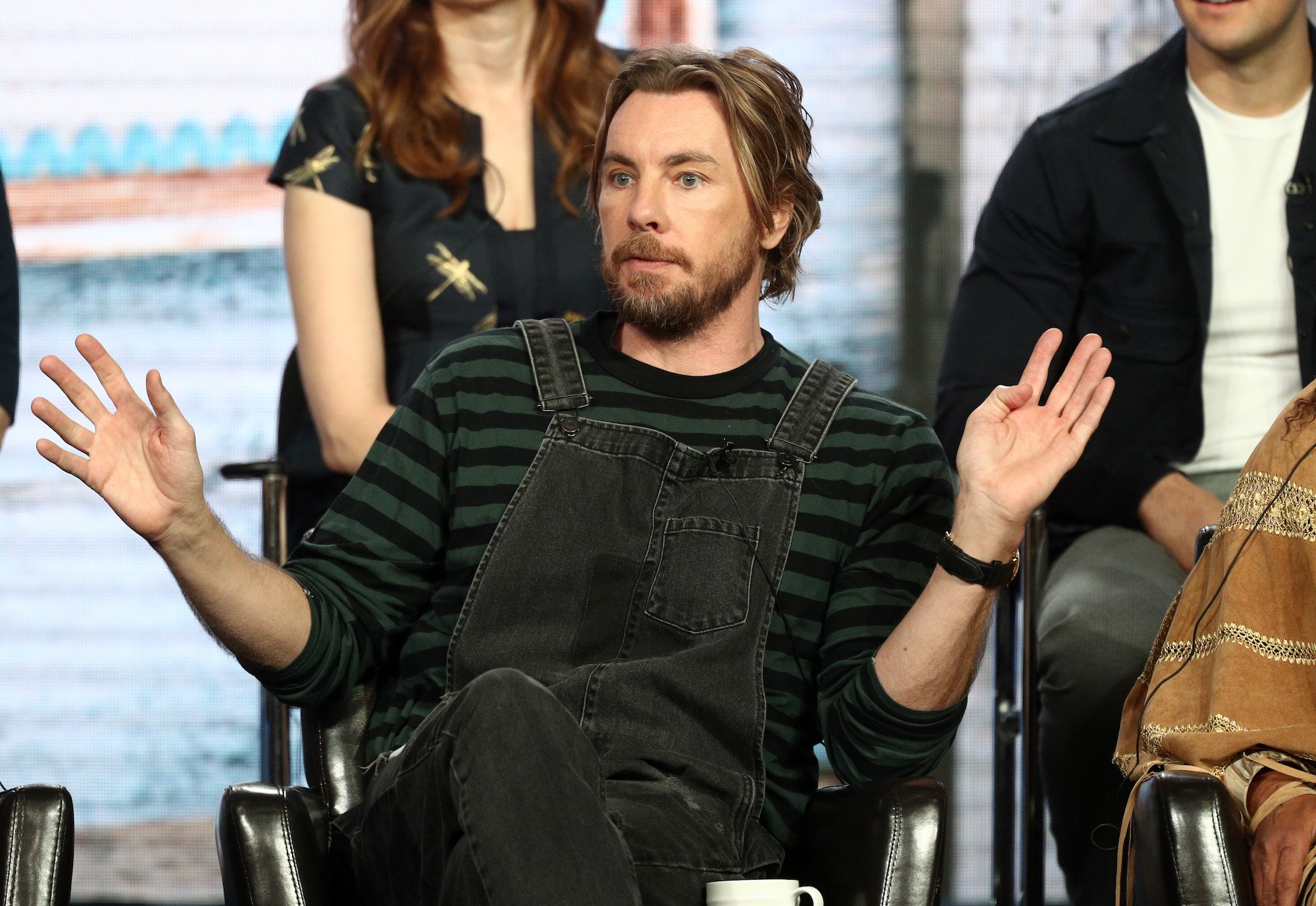 Dax Shepard holding his hands up