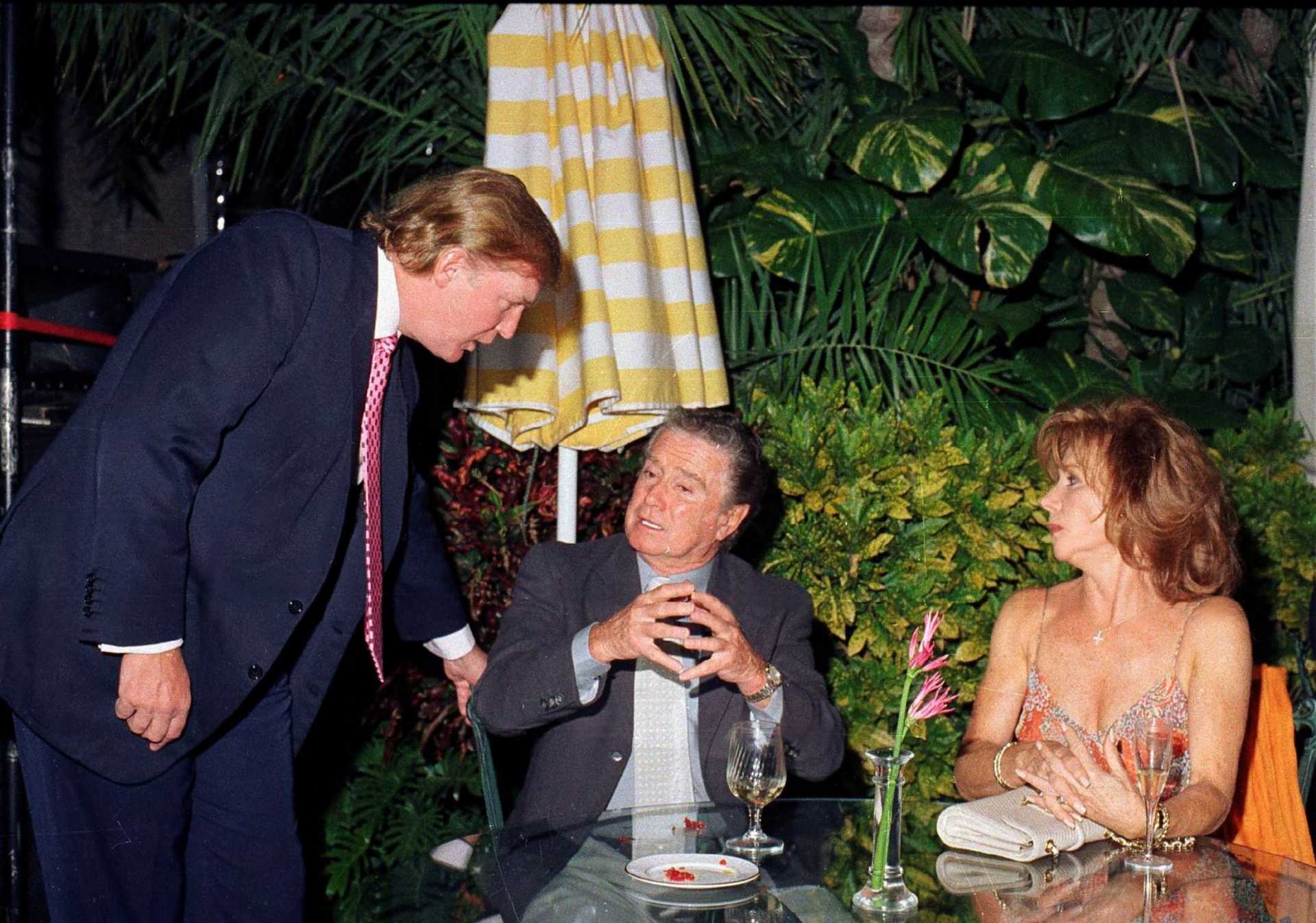 Donald Trump with Regis Phibin and his wife, Joy at Mar-a-Lago in 2000| Davidoff Studios/Getty Images