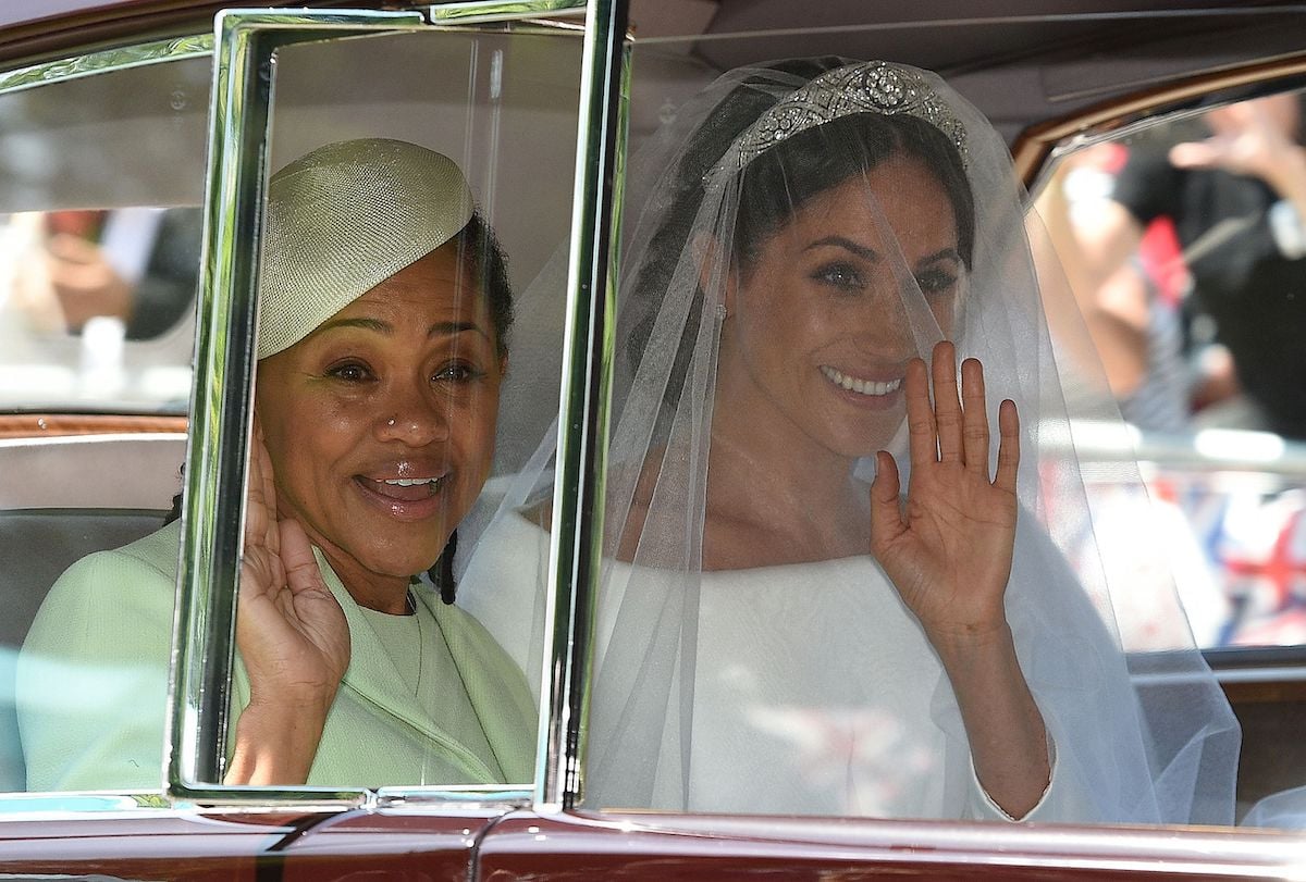 Meghan Markle (R) and her mother, Doria Ragland, arrive for her wedding ceremony to marry Britain's Prince Harry, Duke of Sussex, at St George's Chapel, Windsor Castle, in Windsor, on May 19, 2018