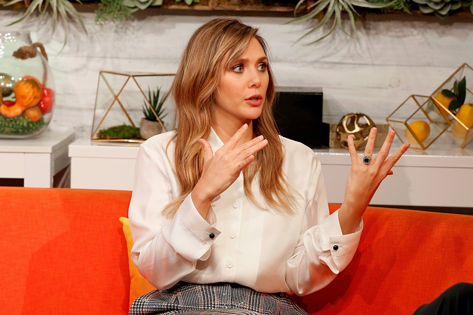 Elizabeth Olsen, the MCU's Scarlet Witch, attends BuzzFeed's "AM To DM" on October 10, 2019 