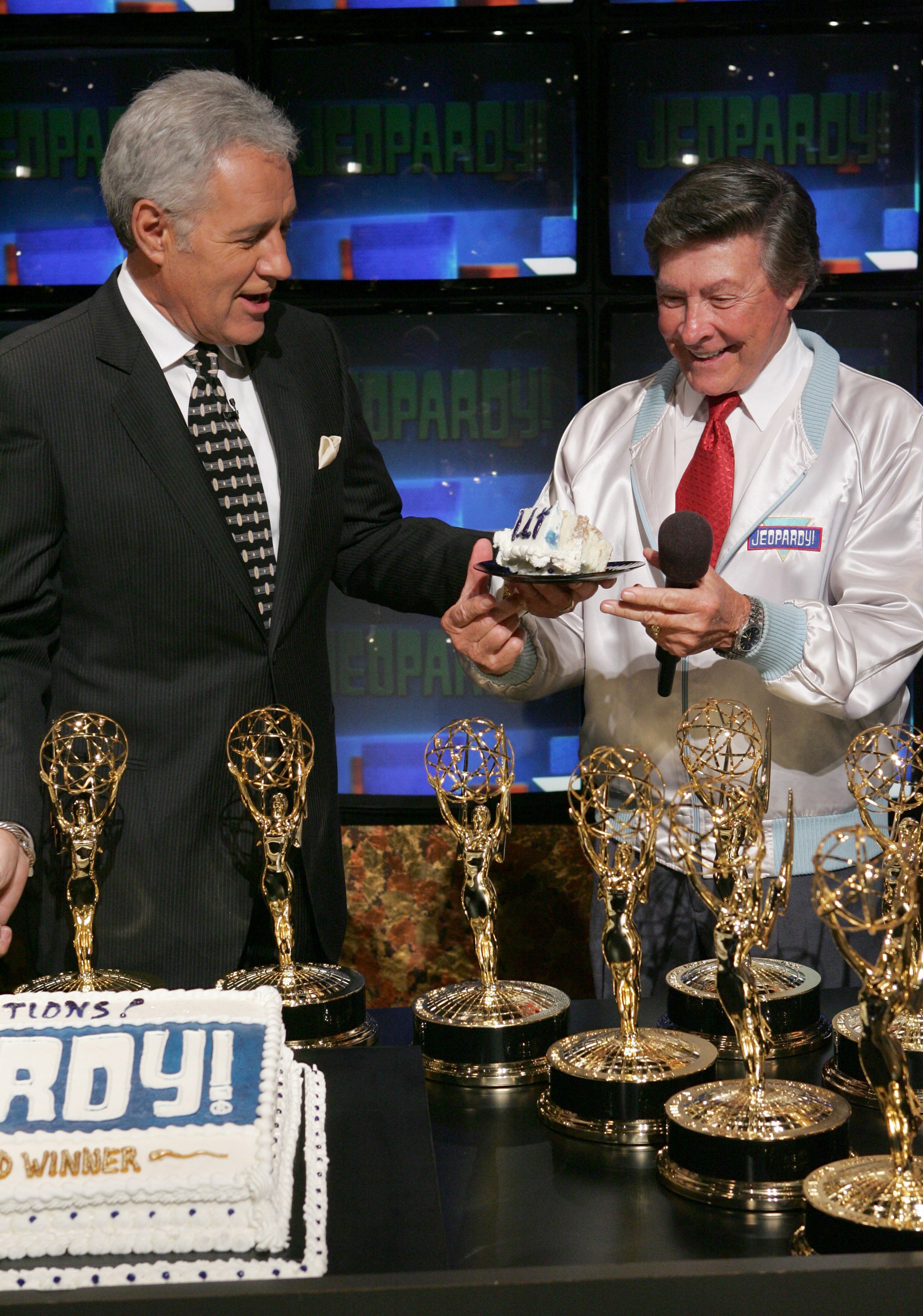 Alex Trebek (left) and Johnny Gilbert