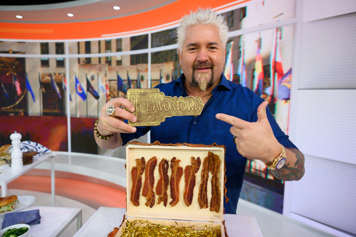 Guy Fieri, pointing to the key to 'Flavortown'