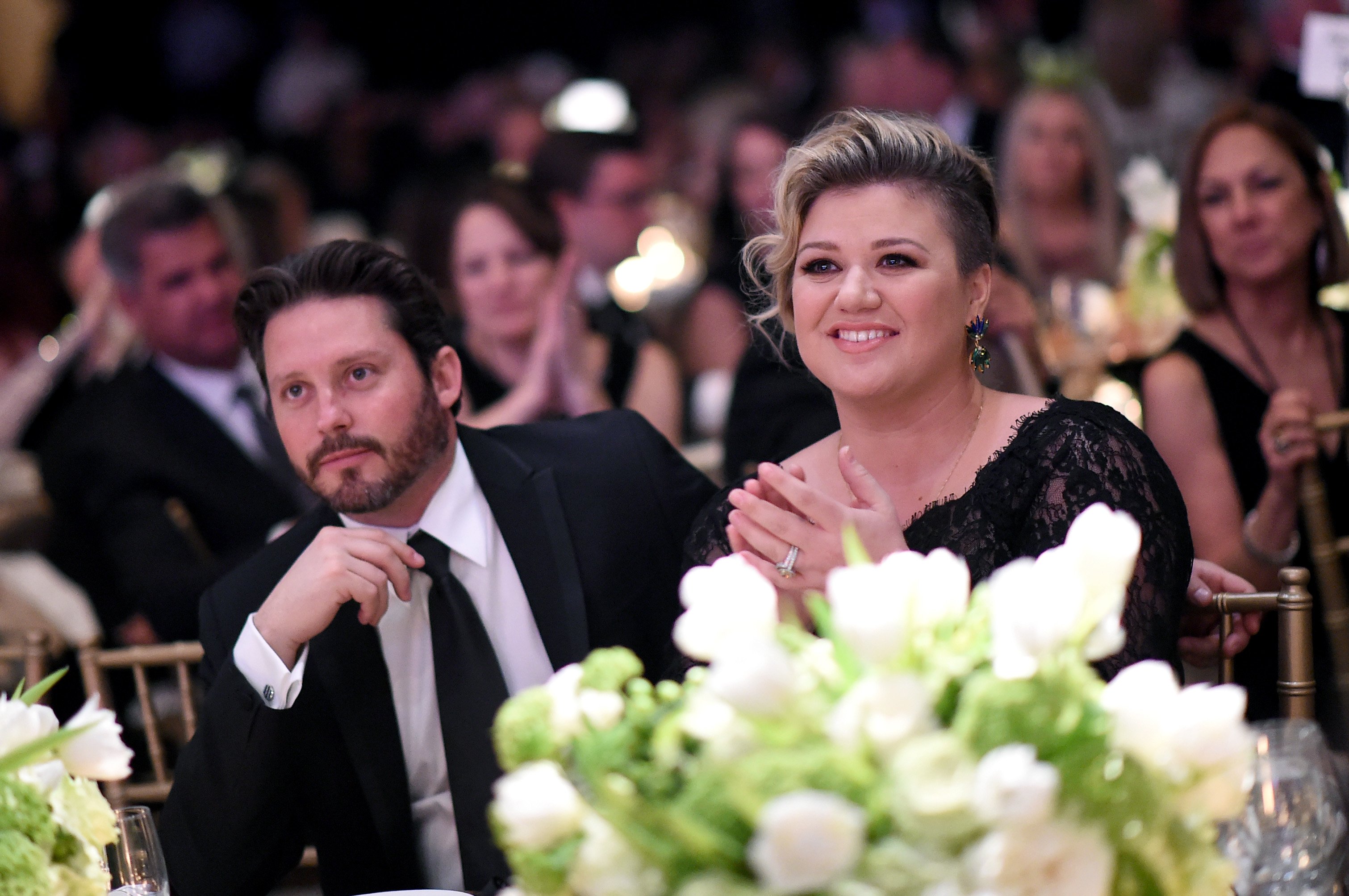 Kelly Clarkson (right) and her husband Brandon Blackstock