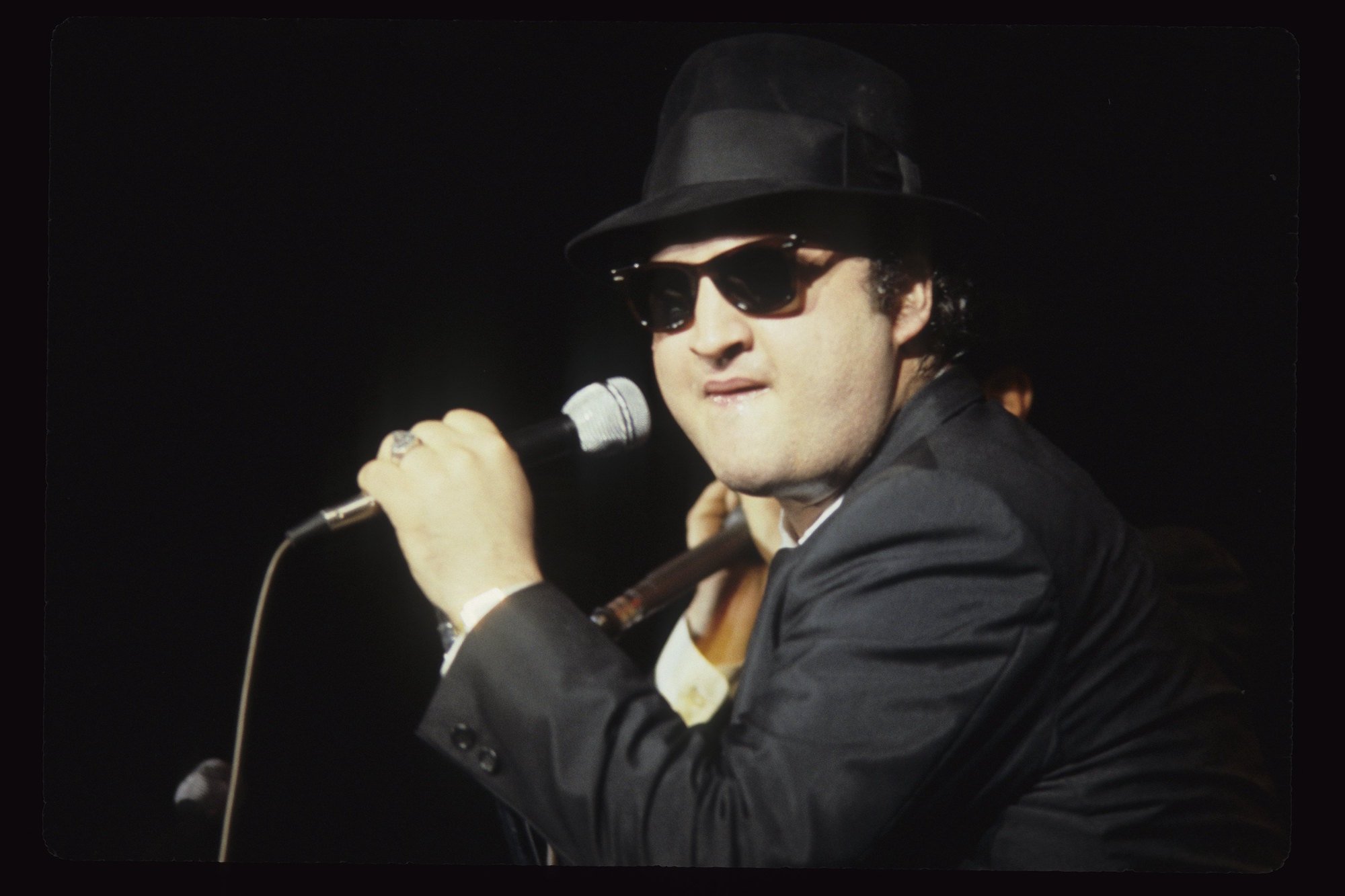 What John Belushi Really Did When He Chugged Whiskey in ‘Animal House’