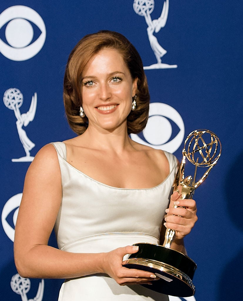 The X-Files cast member Gillian Anderson with her Emmy award