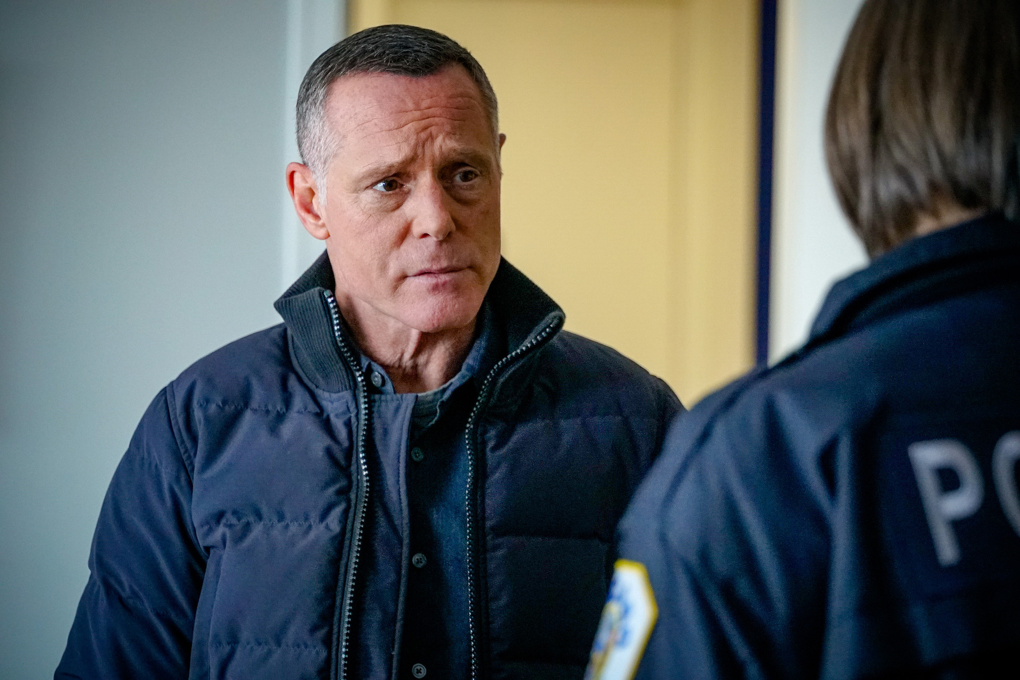 Jason Beghe as Sergeant Hank Voight looking to the side