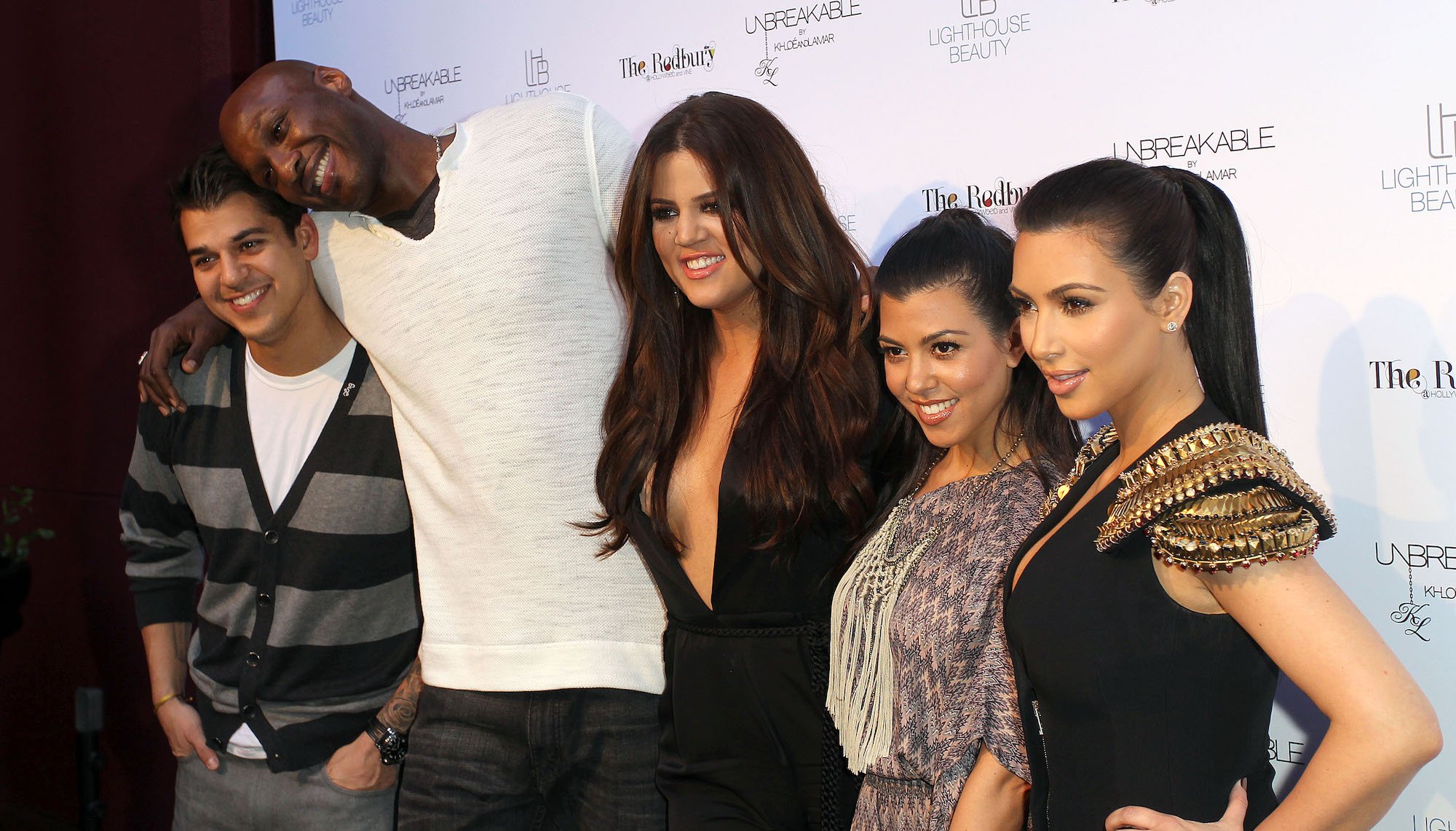 (L-R) Rob Kardashian, Lamar Odom, Khloé Kardashian, Kourtney Kardashian, Kim Kardashian