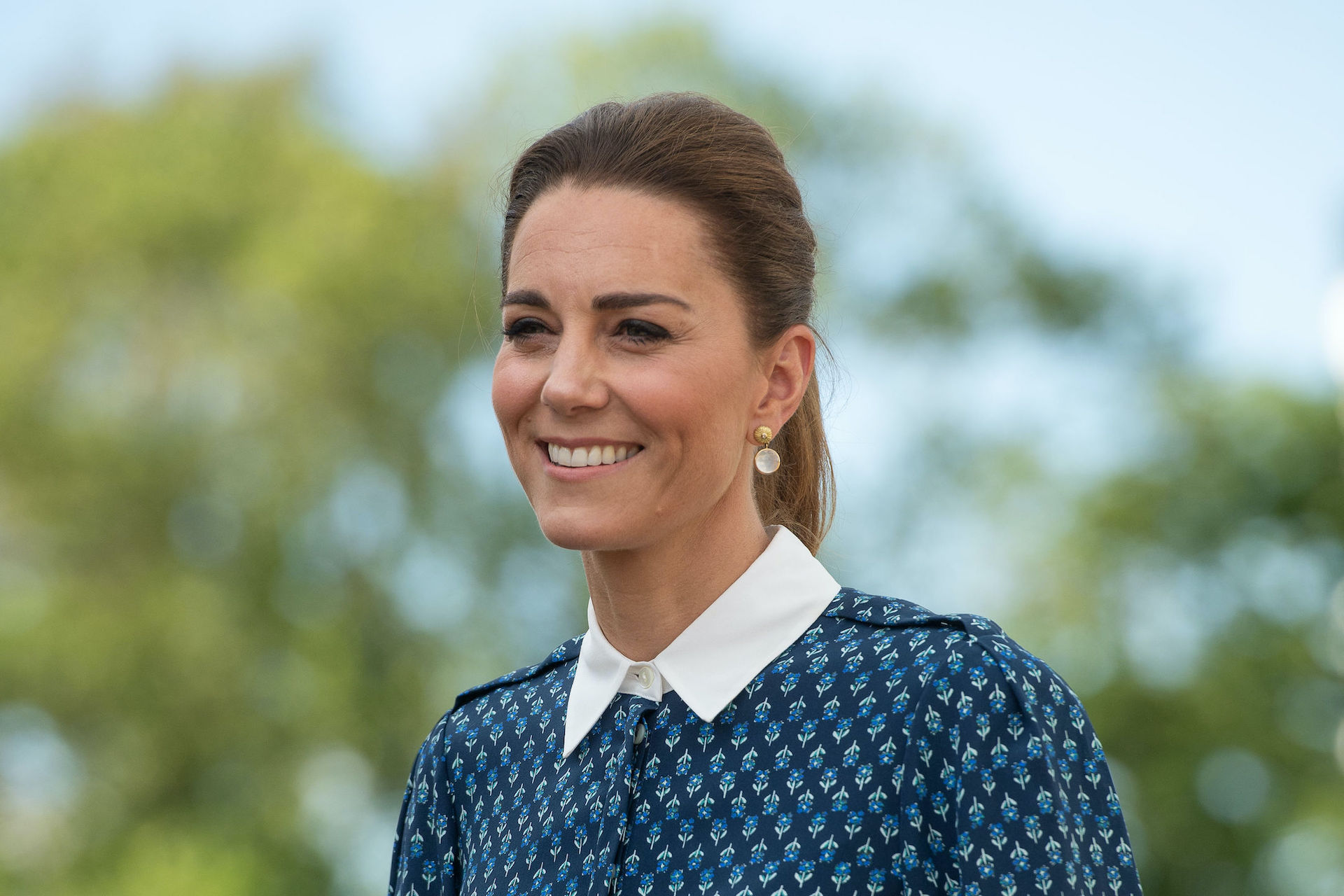 Kate Middleton smiles during a visit to the Queen Elizabeth Hospital