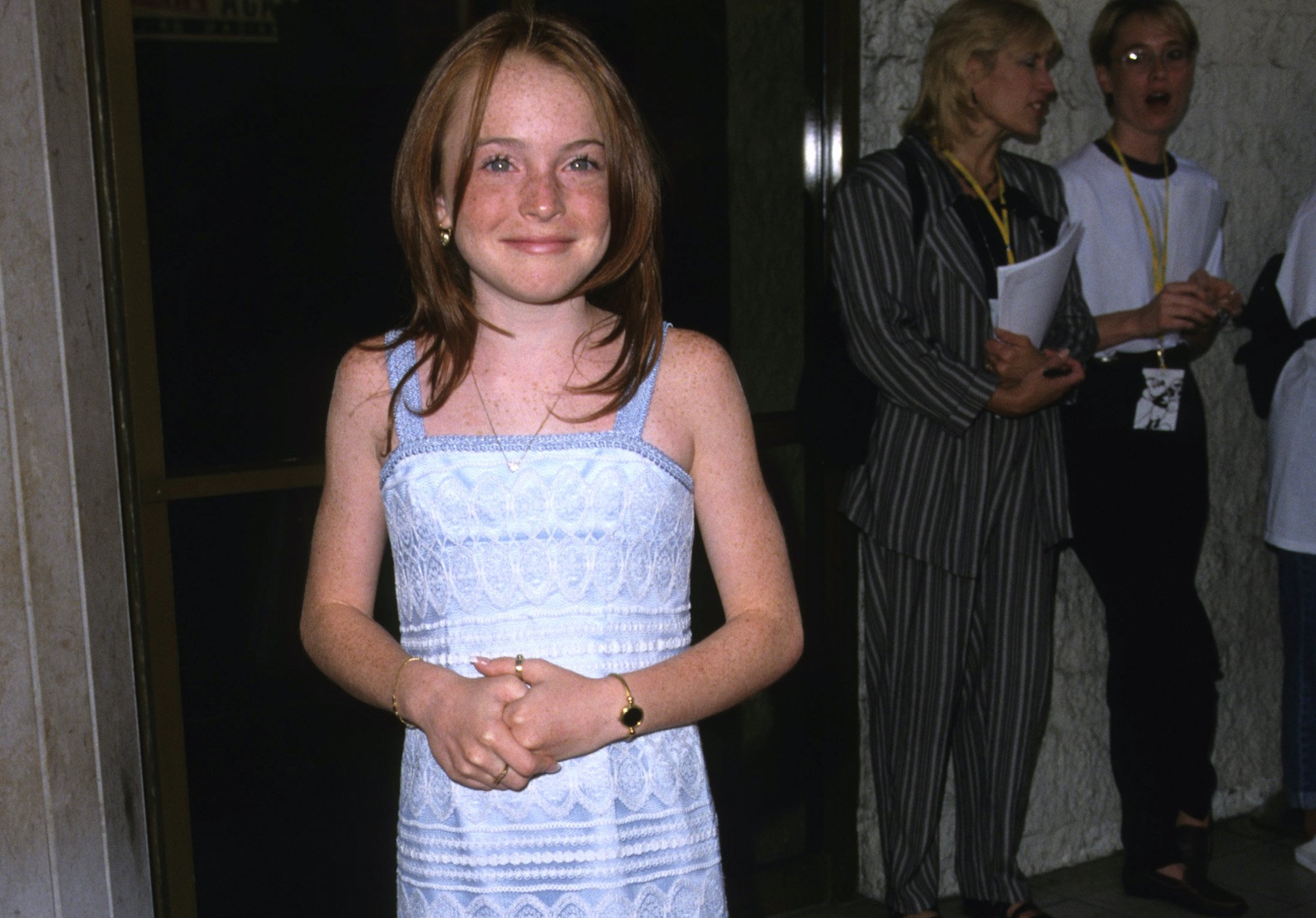 Lindsay Lohan smiles on the red carpet as she attends premiere of 'The Parent Trap'