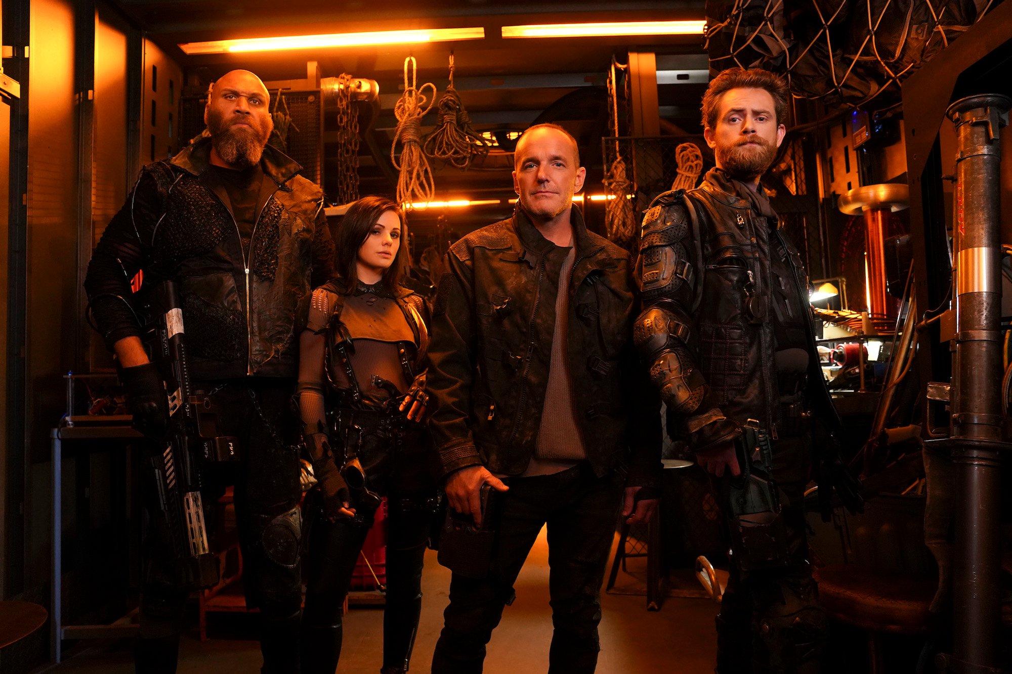 Winston James Francis as Jaco, Brooke Williams as Snowlfake, Clark Gregg as Sarge, and Matt O'leary as Pax in an industrial room