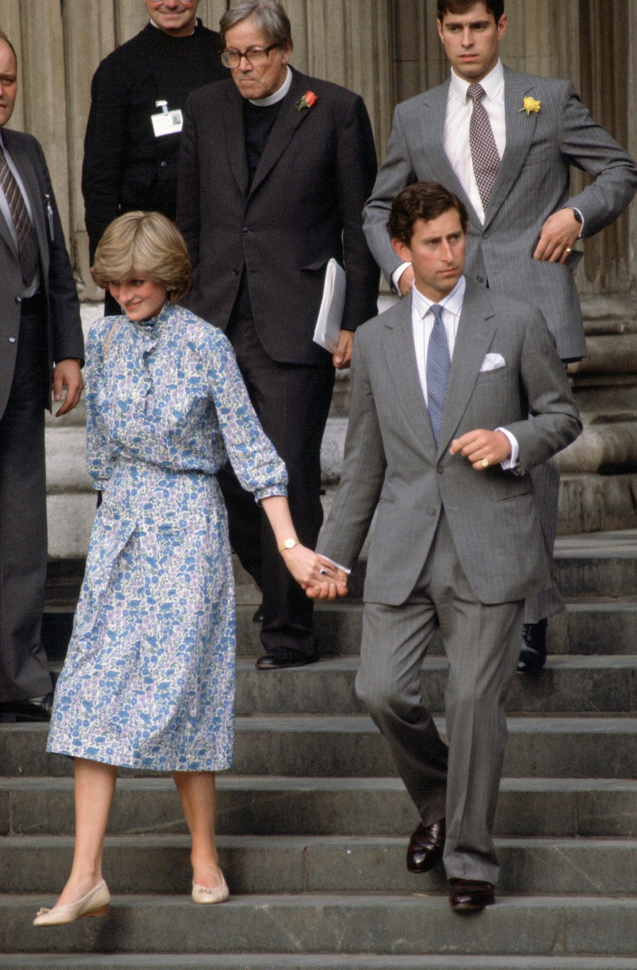 Princess Diana and Prince Charles walk down the steps of St. Paul's Cathedral after their final wedding rehearsal