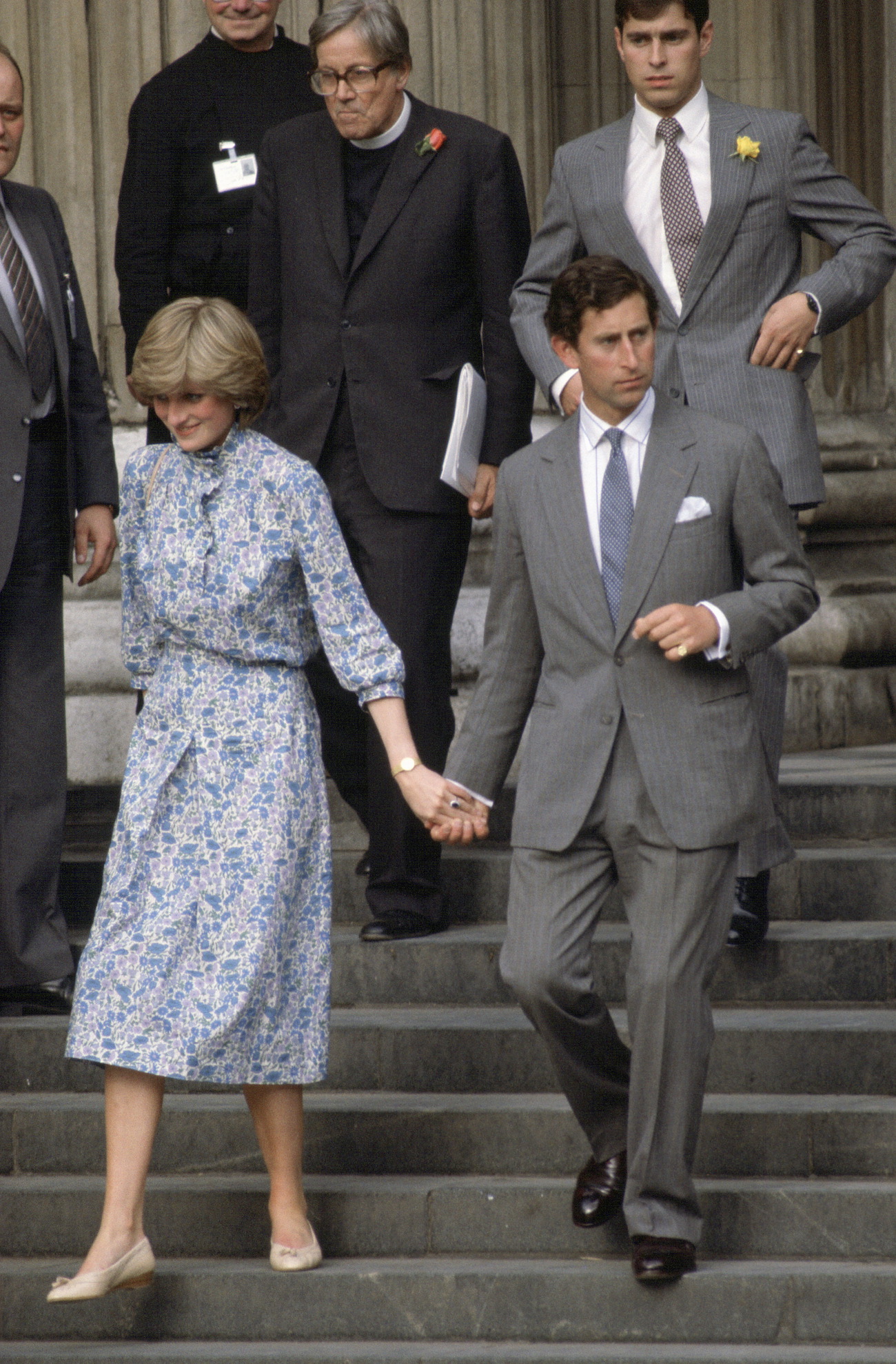 Princess Diana and Prince Charles walk down the steps of St. Paul's Cathedral after their final wedding rehearsal