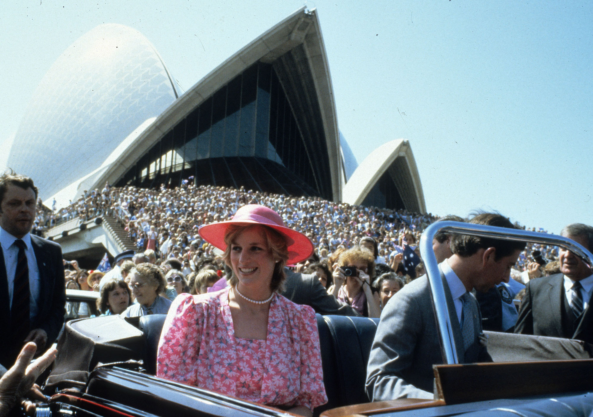 Princess Diana and Prince Charles in a car outside the Sydney Opera House