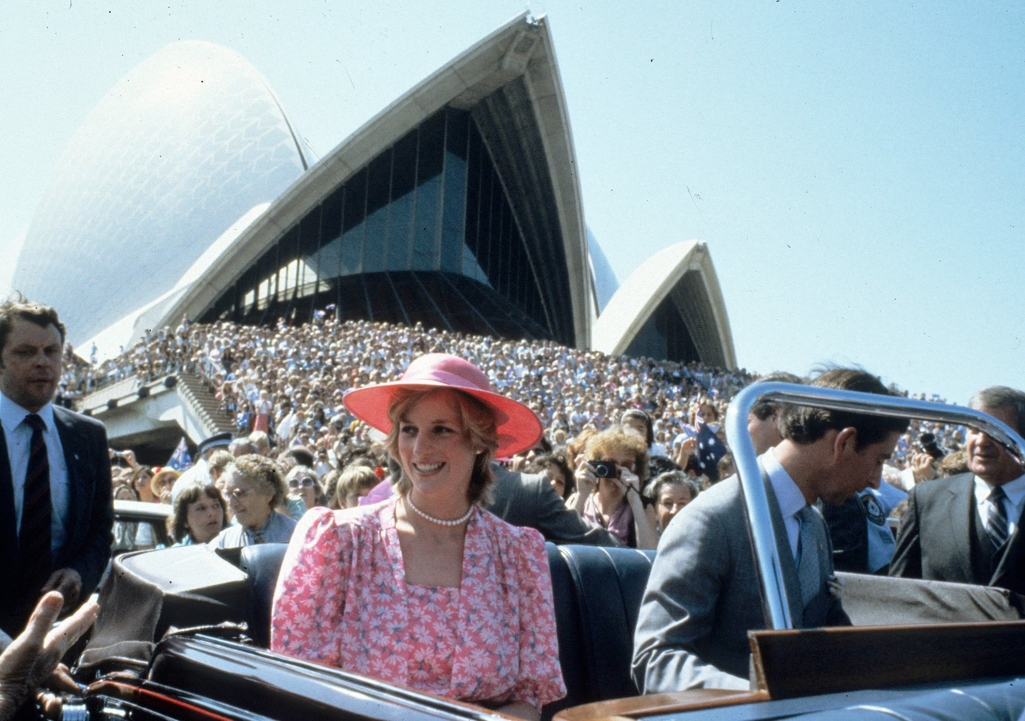 Princess Diana and Prince Charles in a car outside the Sydney Opera House