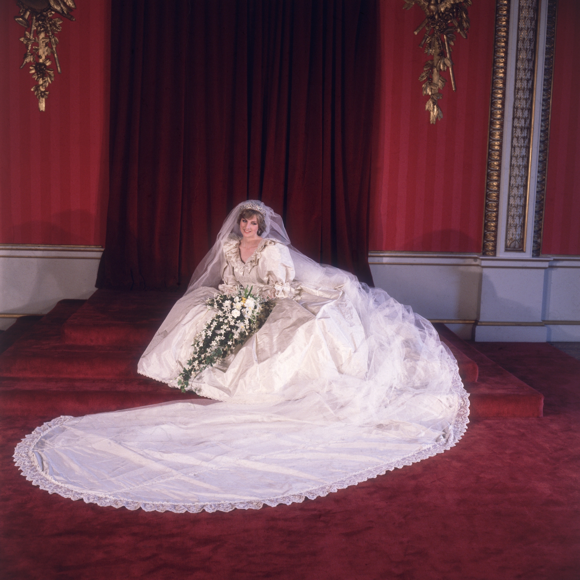 Princess Diana poses in her wedding gown for a formal portrait