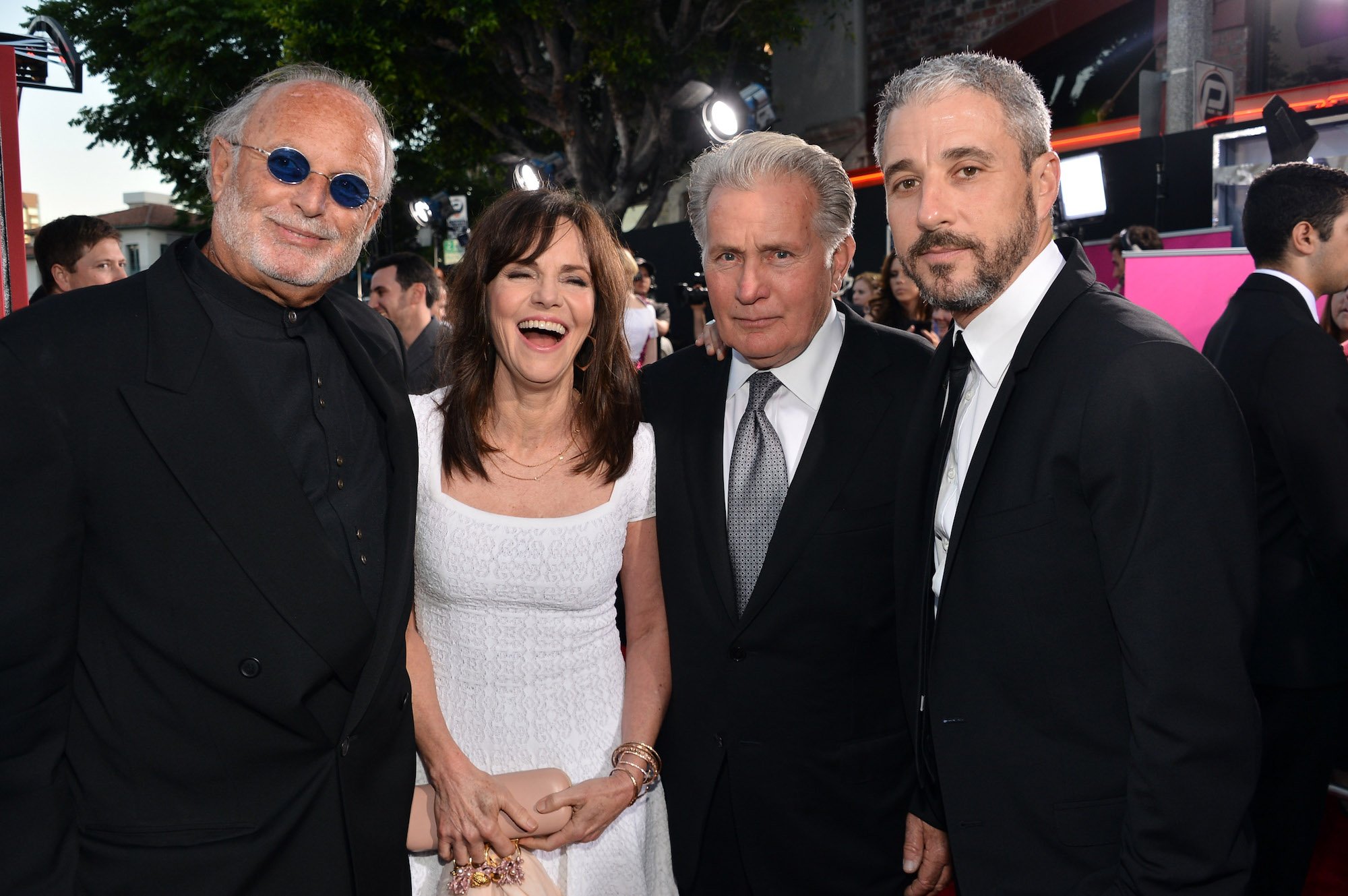 Avi Arad, Sally Field, Martin Sheen, and Matt Tolmach smiling at the camera