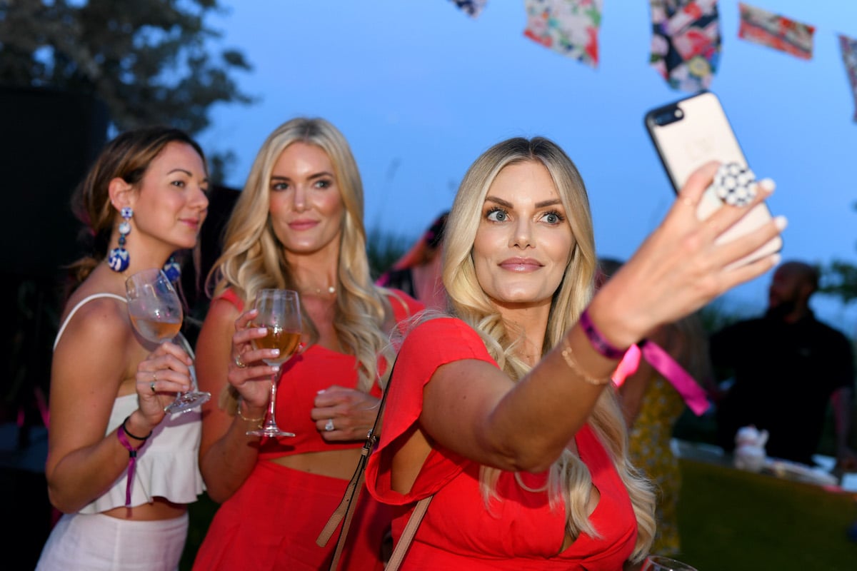 Ashley Wirkus and Lauren Wirkus pose for a selfie during Camilla Miami Swim Week