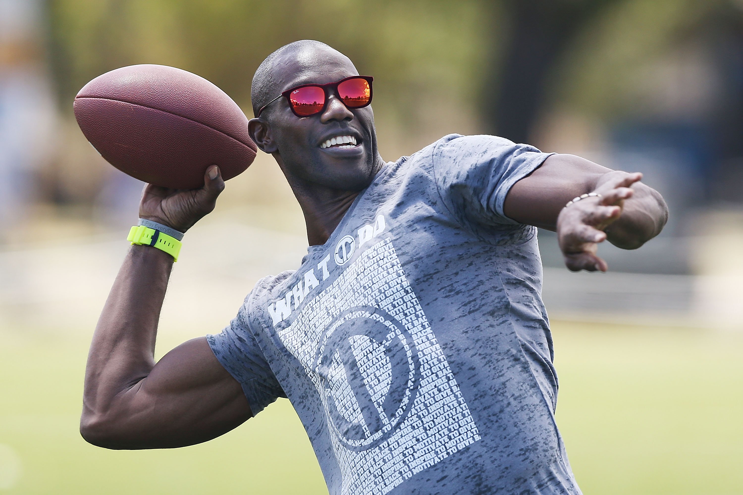 Terrell Owens throwing a football