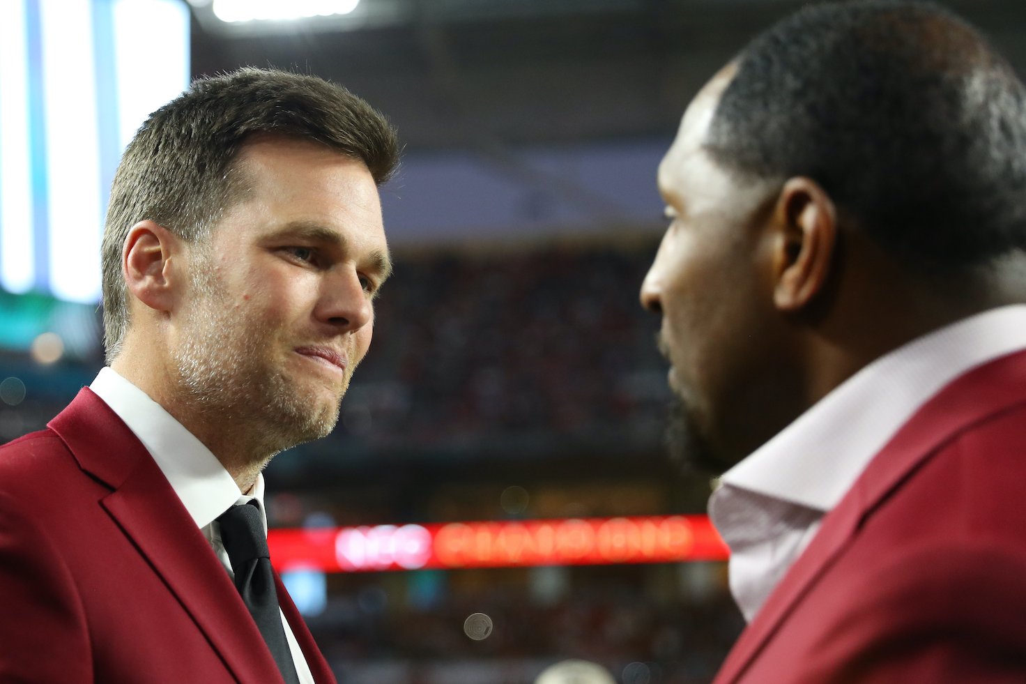 Brady of the Tampa Bay Bucs talks with NFL Hall of Famer Ray Lewis of the Baltimore Ravens prior to Super Bowl LIV between the San Francisco 49ers and the Kansas City Chiefs