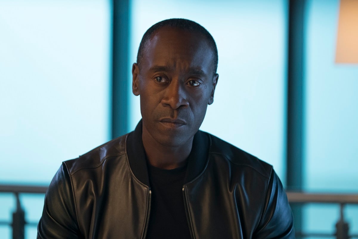 Marvel superhero Don Cheadle wearing a leather jacket