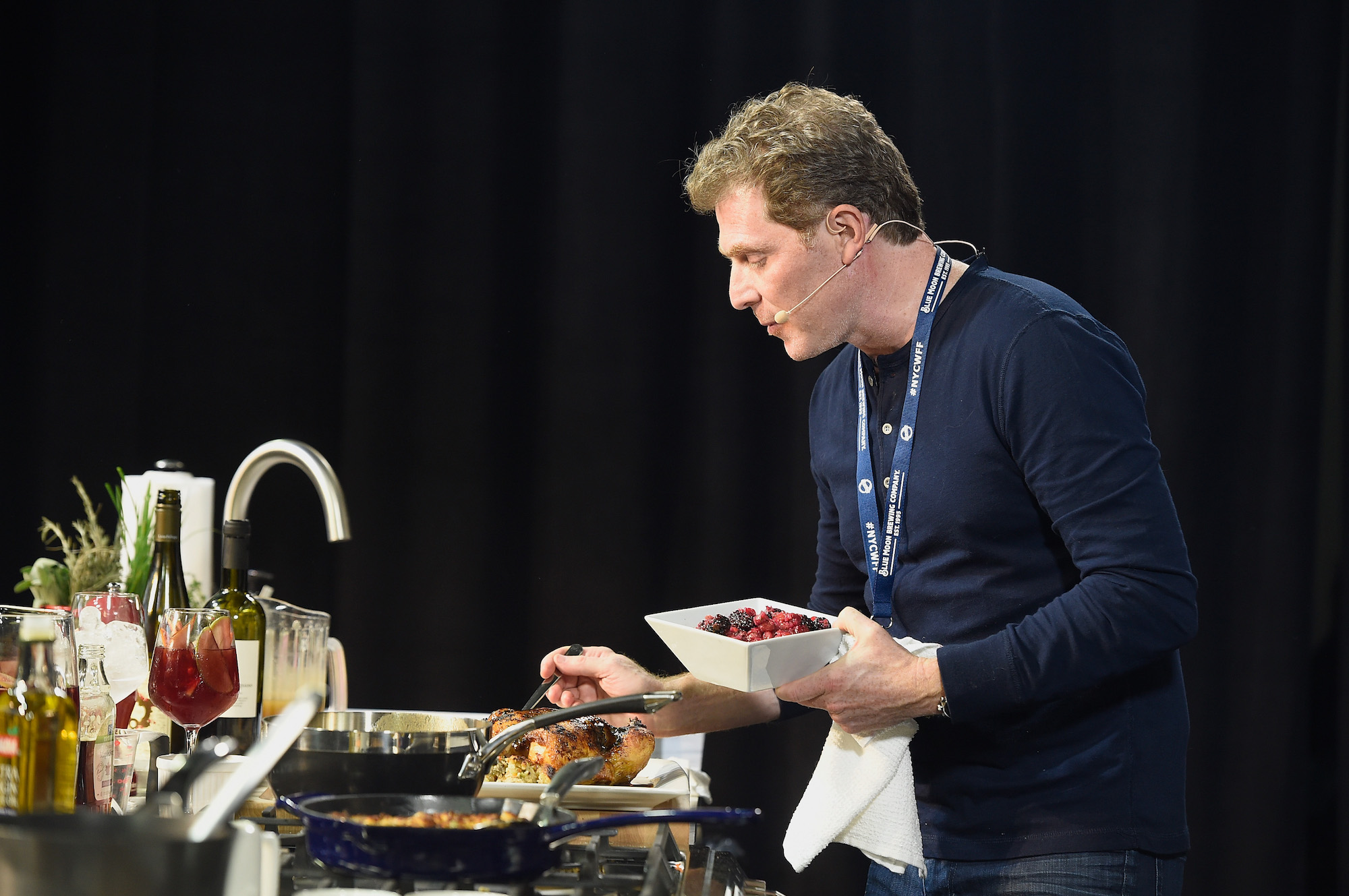 Bobby Flay cooks onstage