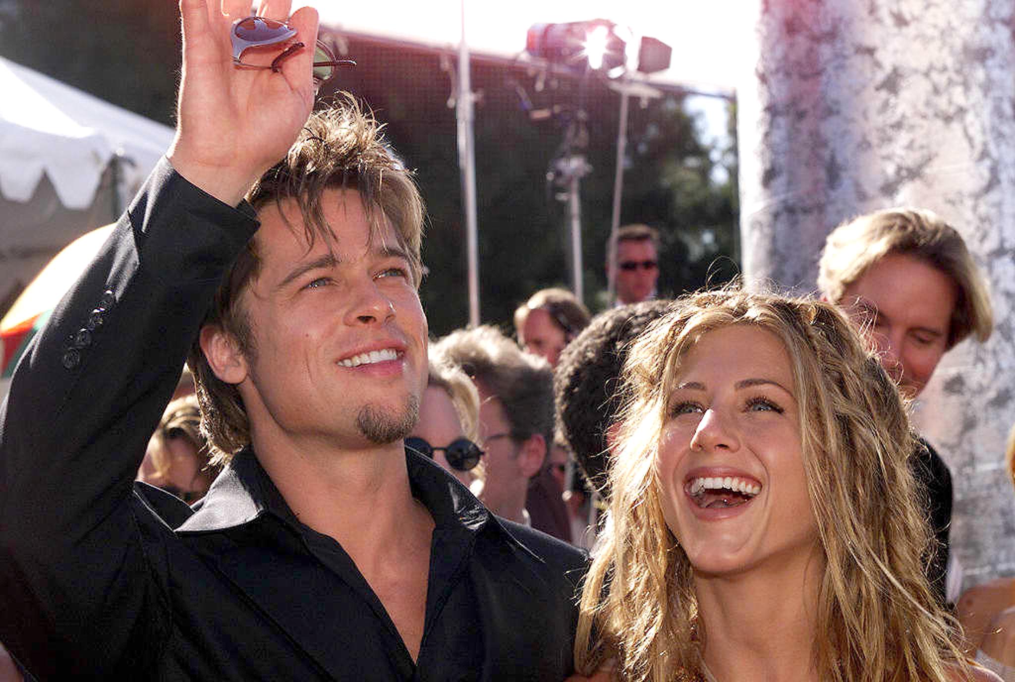 Brad Pitt and Jennifer Aniston arrive for the 51st Emmy Awards on  Sept. 12, 1999 in Los Angeles, California.