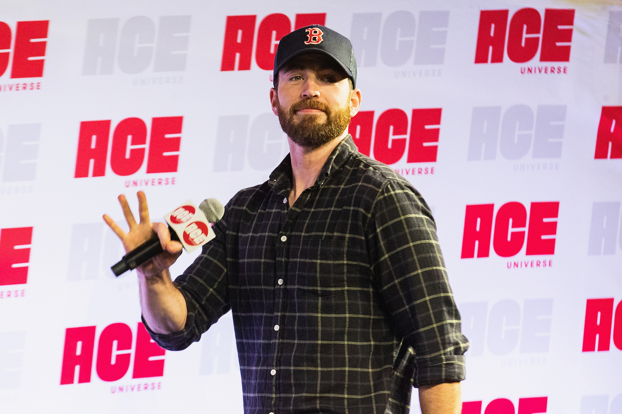 Chris Evans speaks on stage