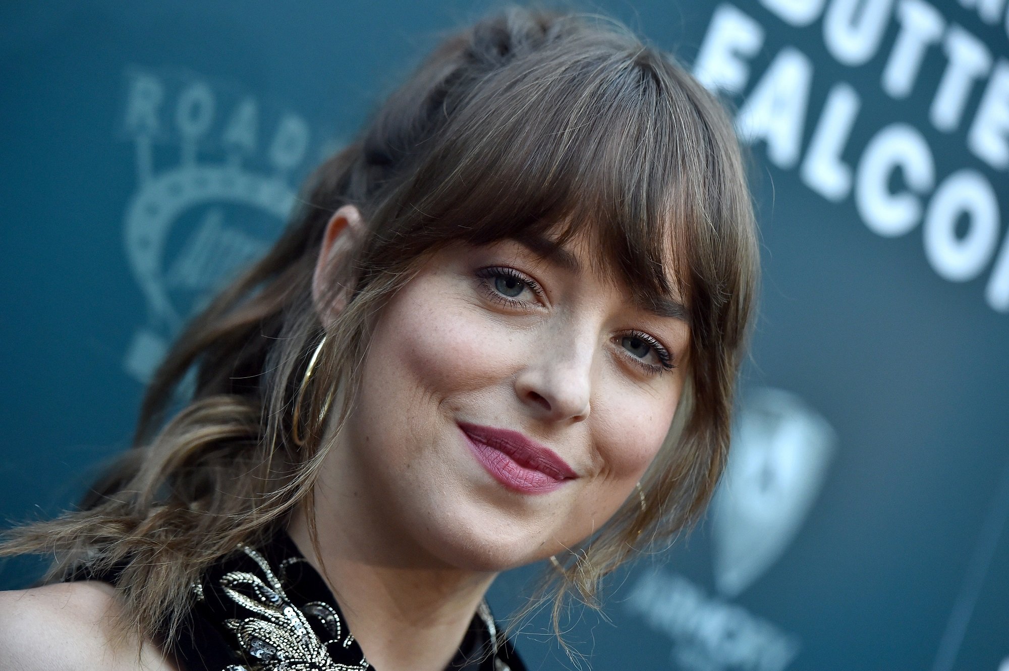 Dakota Johnson attends the LA Special Screening of 'The Peanut Butter Falcon' on August 01, 2019