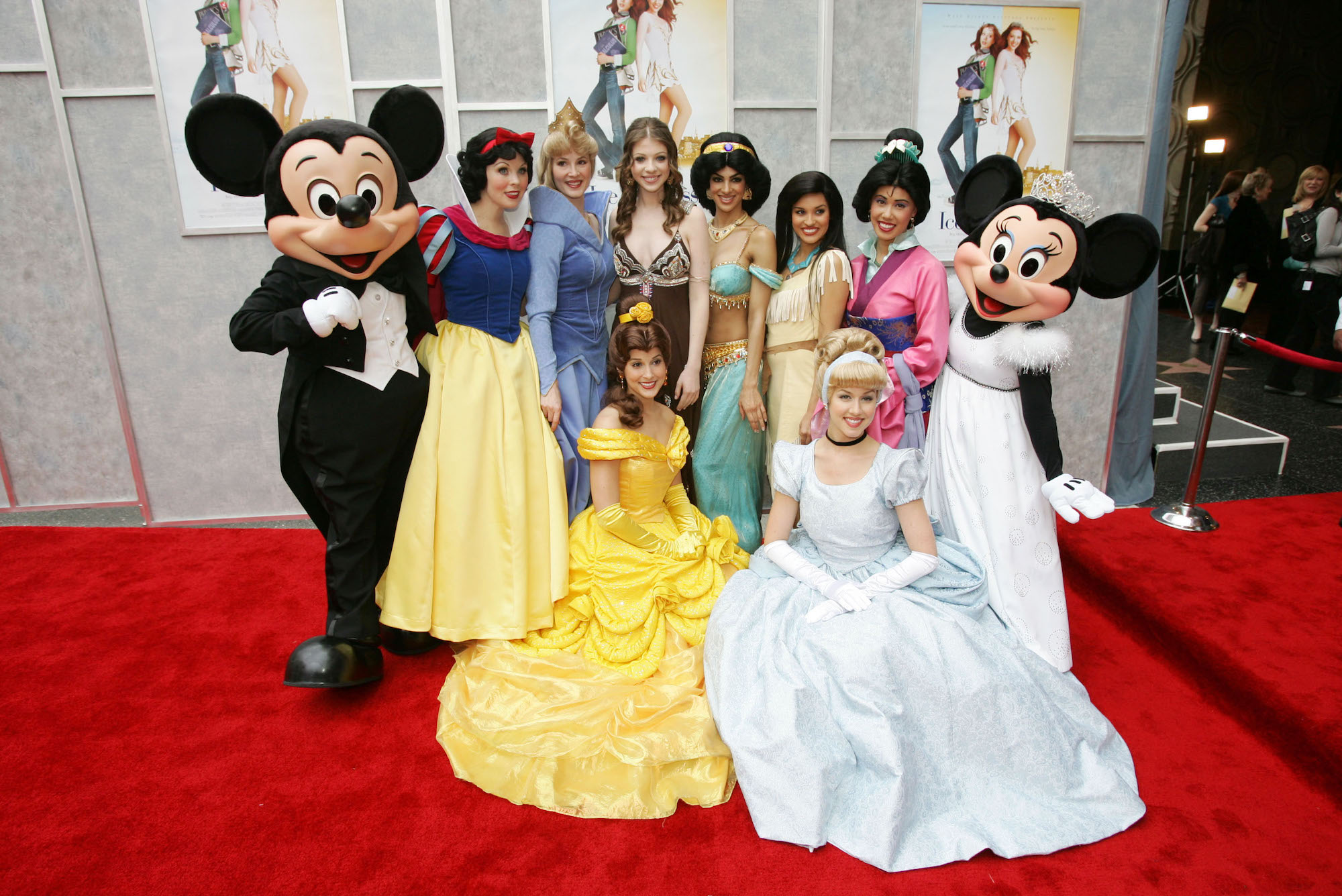 Michelle Trachtenberg poses with Disney princesses at the Walt Disney premiere of 'The Ice Princess' on March 13, 2005