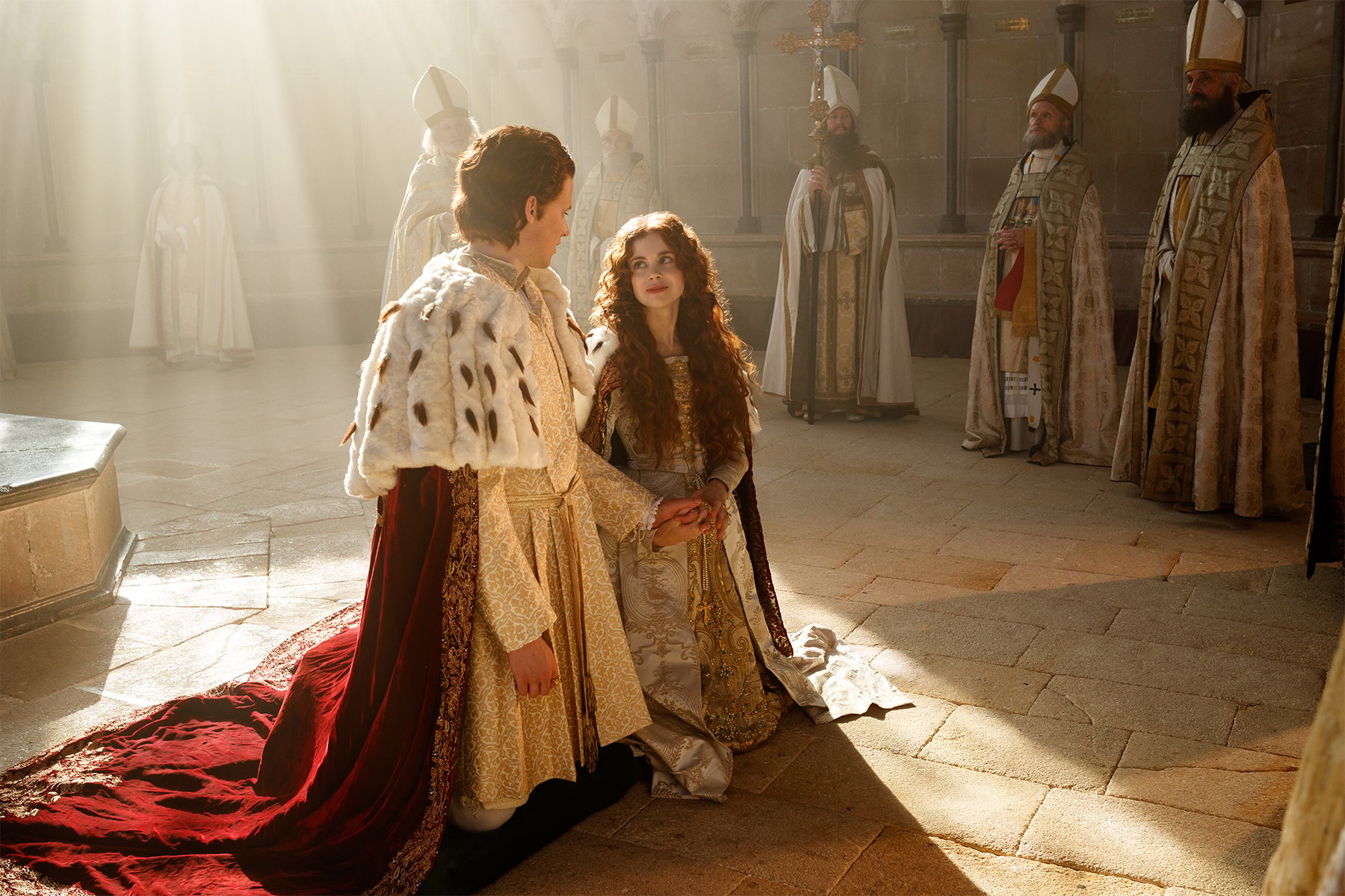 Henry and Catherine kneeling