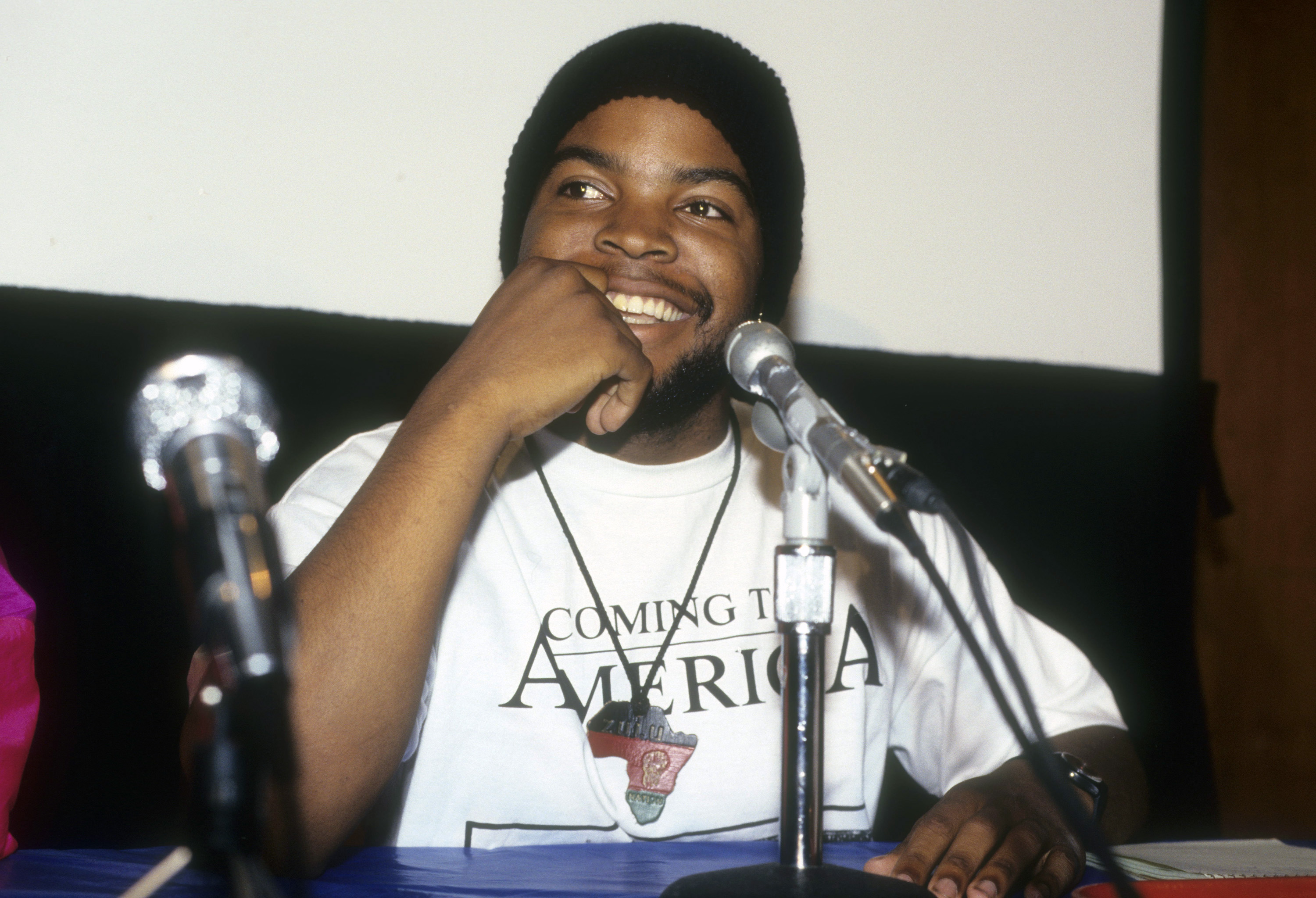 Ice Cube wearing a necklace shaped like Africa