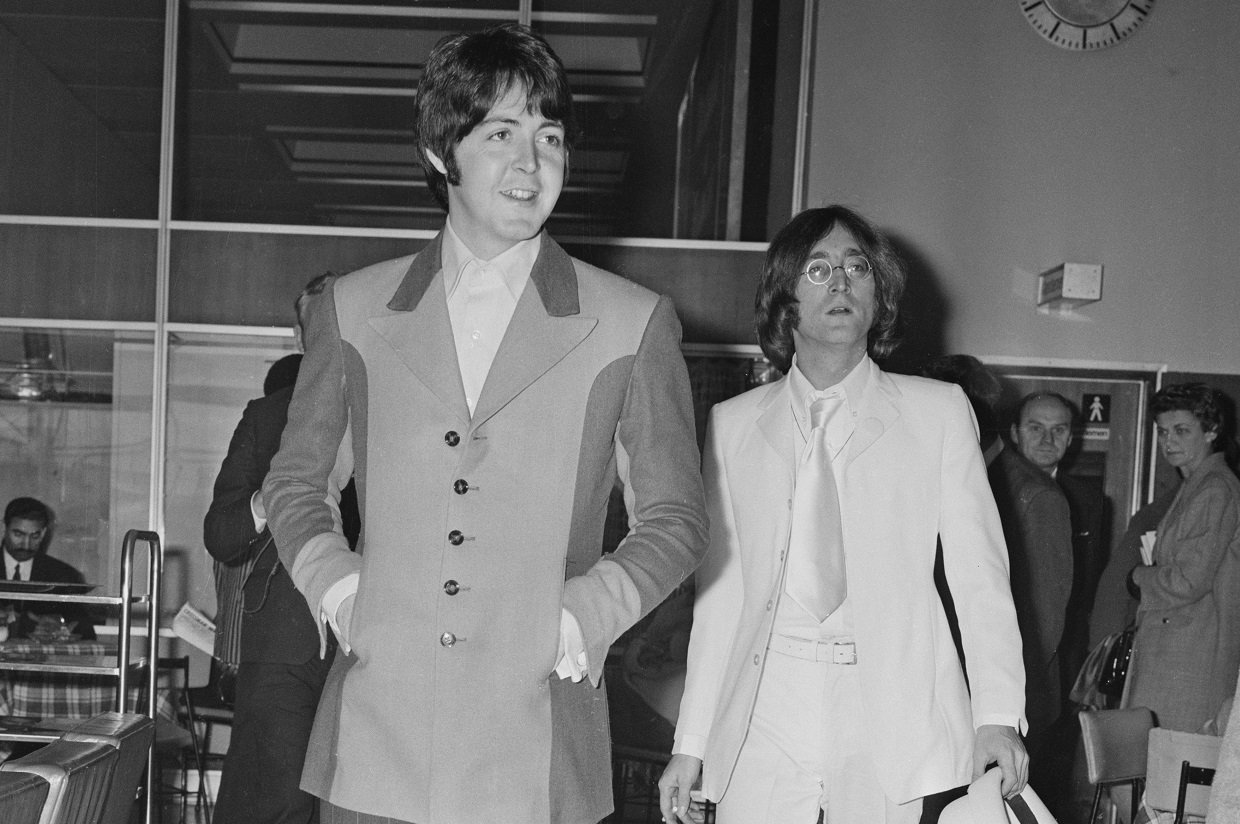 Paul McCartney and John Lennon at Heathrow