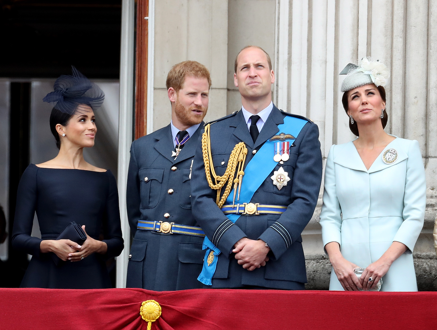 Prince Harry, Meghan Markle, Prince William, and Kate Middleton on the balcony of Buckingham Palace, as members of the Royal Family attend events to mark the centenary of the RAF