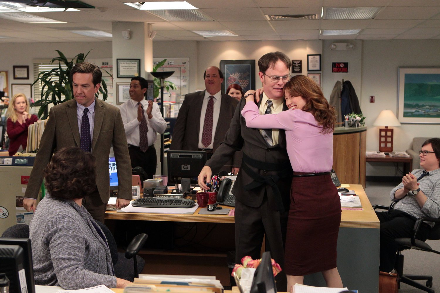 Rainn Wilson as Dwight Schrute, Ellie Kemper as Erin Hannon in 'The Office'