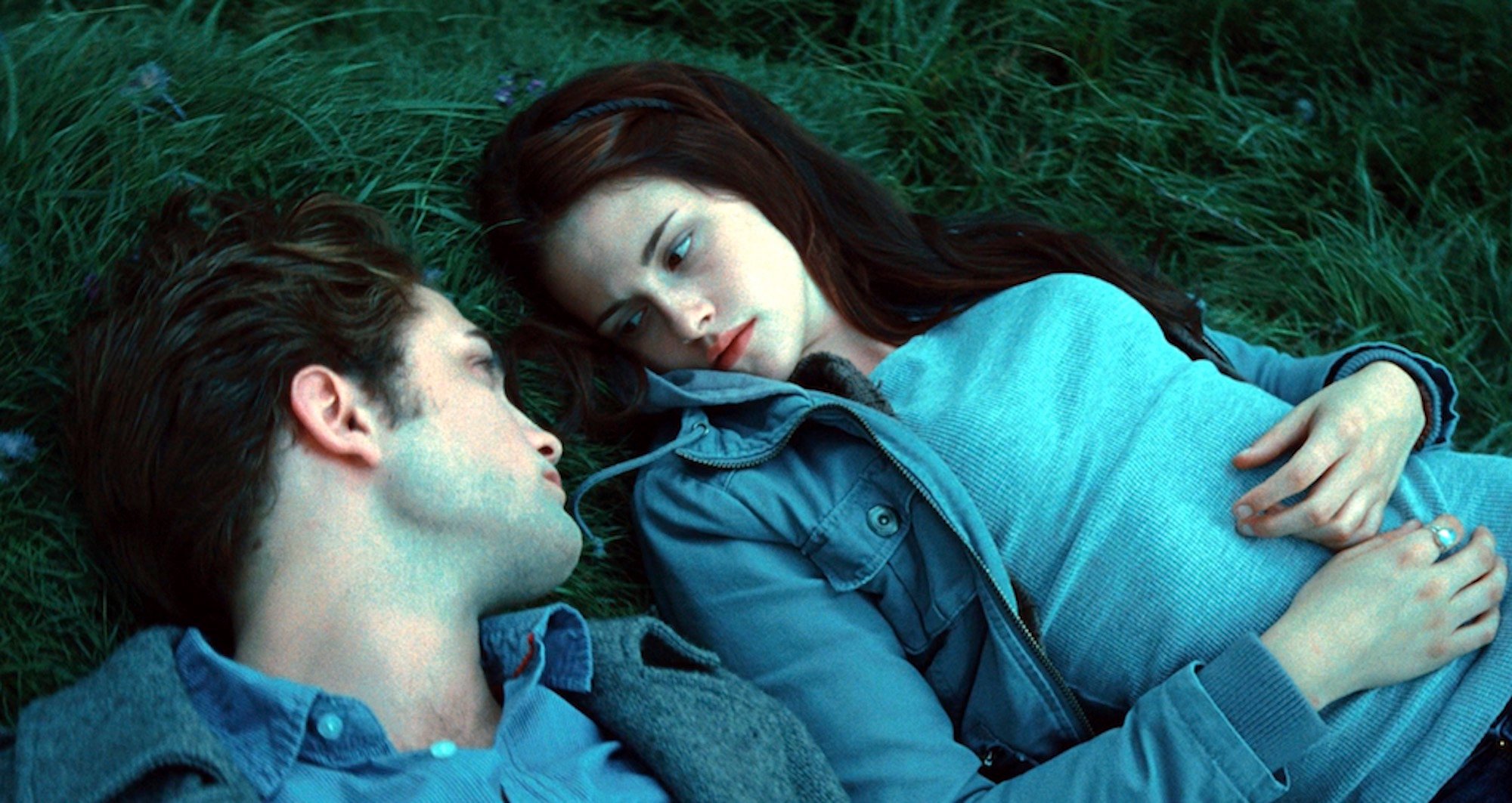 Edward Cullen (Robert Pattinson) and Bella Swan (Kristen Stewart) in his meadow in 'Twilight'