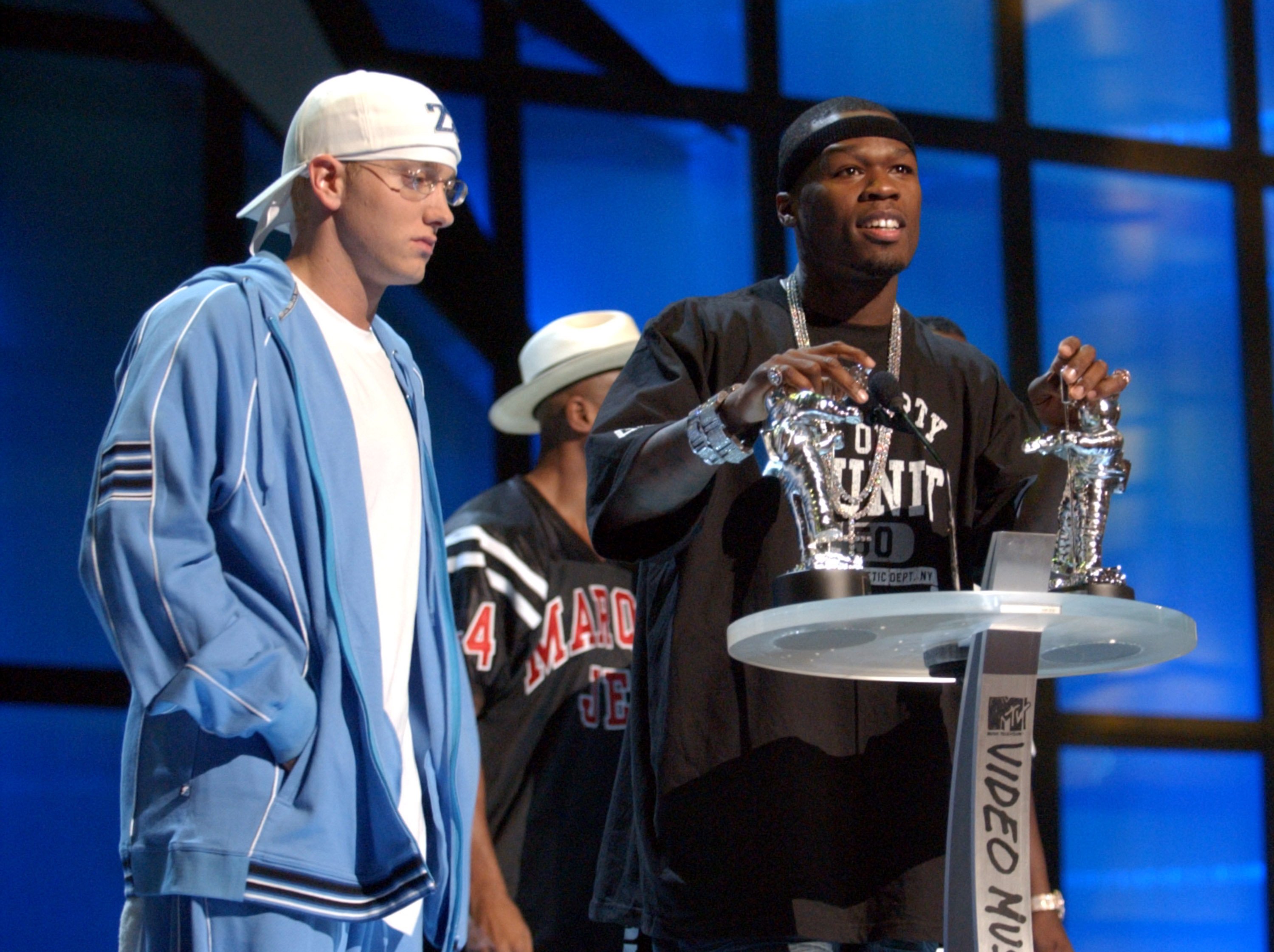 Eminem and 50 Cent at a podium