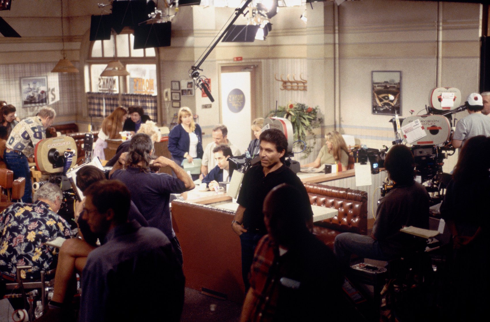 A scene from 'Seinfeld' being filmed at the fictional Monk's Cafe