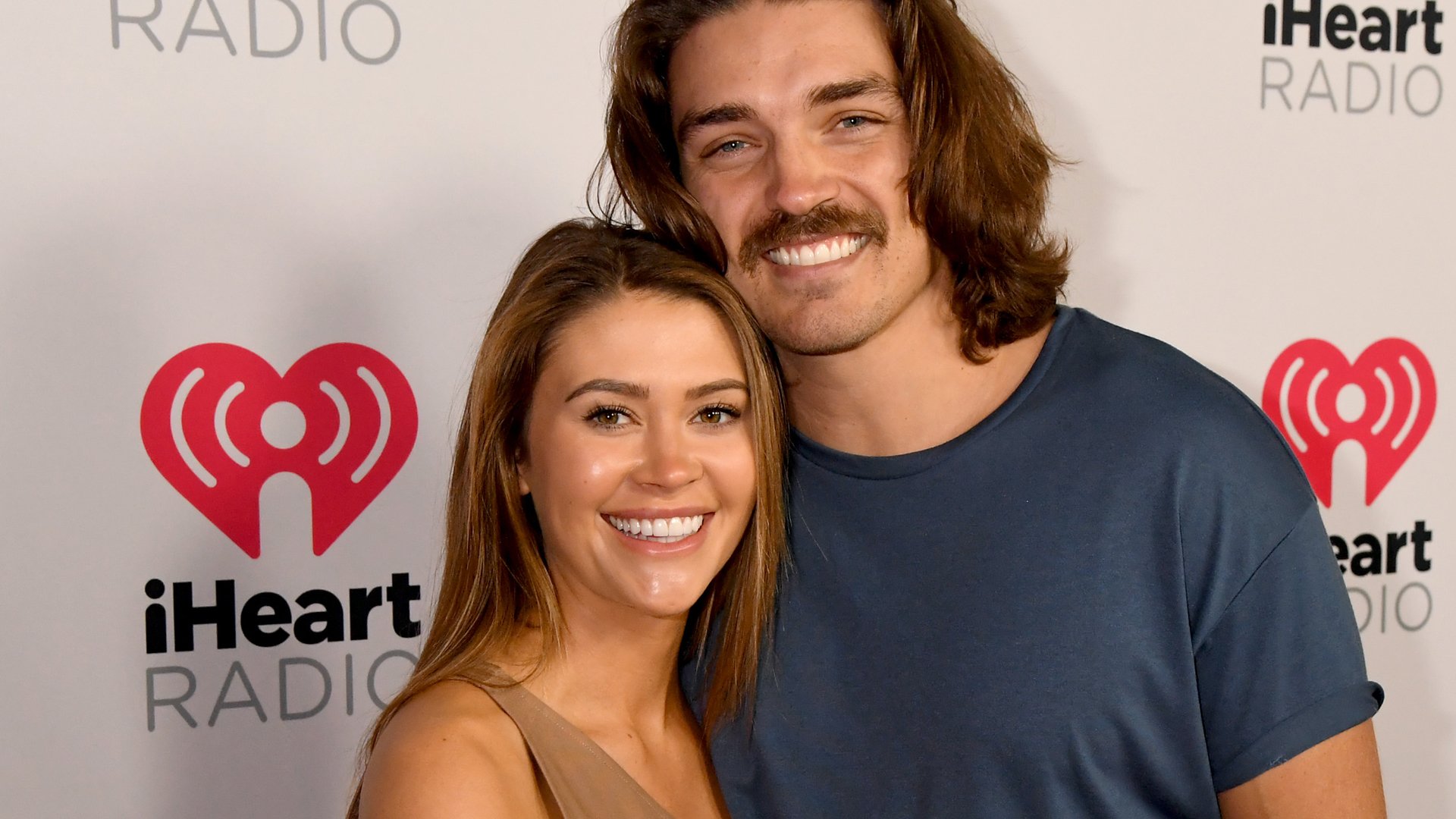 'Bachelor in Paradise' stars Caelynn Miller-Keyes and Dean Unglert attend the 2020 iHeartRadio Podcast Awards at the iHeartRadio Theater on January 17, 2020 in Burbank, California.