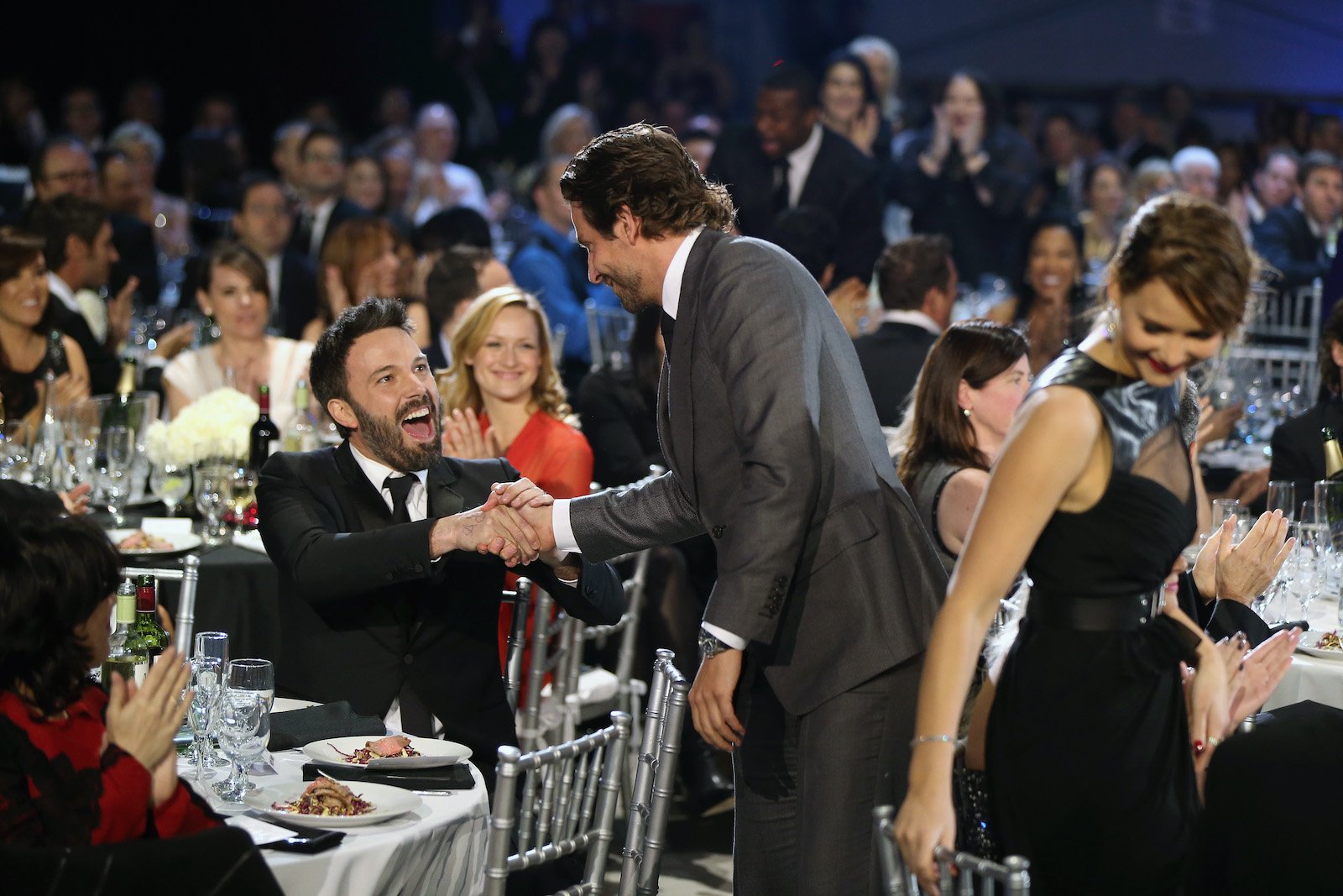 Ben Affleck and Bradley Cooper shake hands at the 2013 Critics' Choice Awards