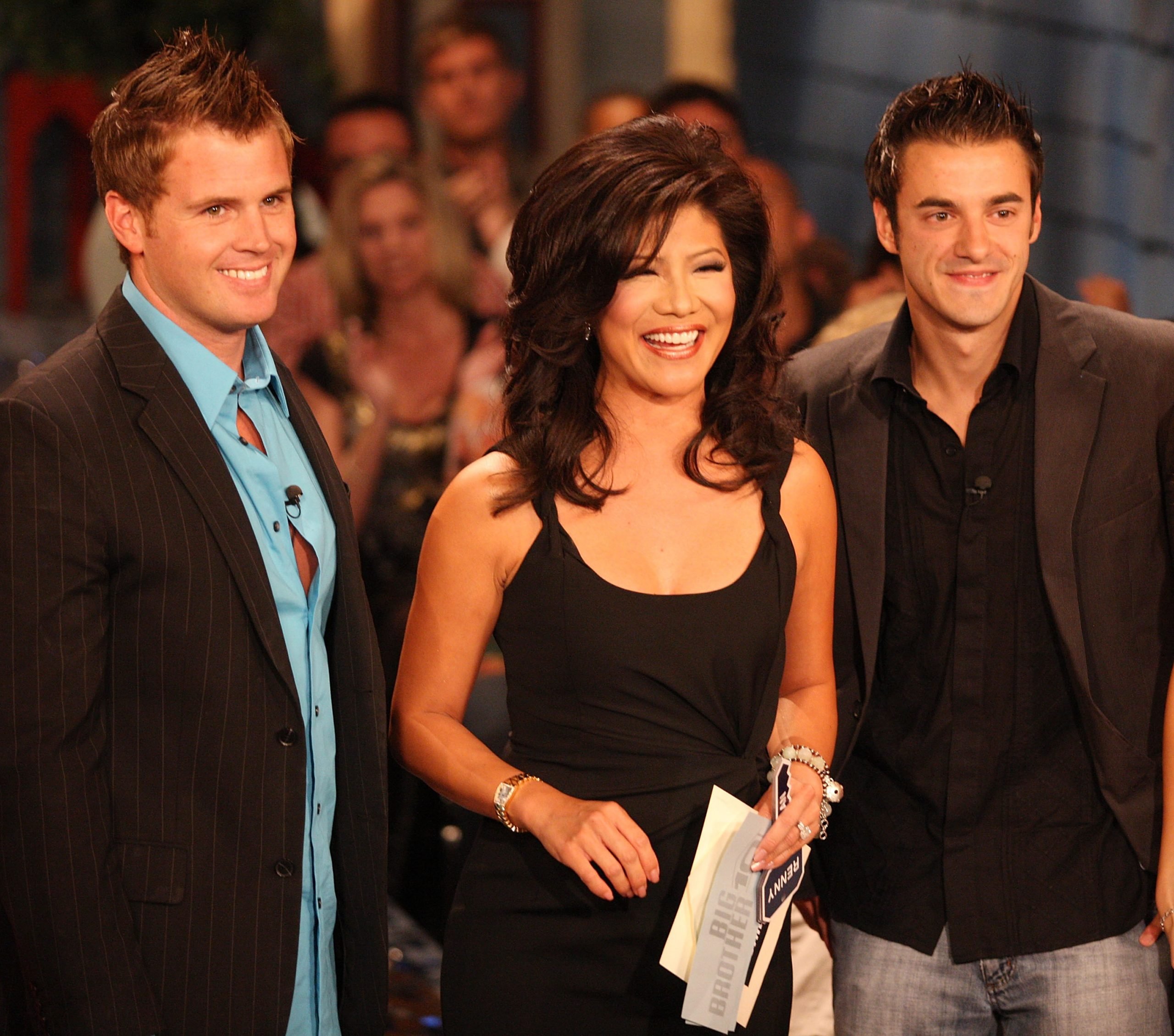 Second place contestant Memphis Garrett, host Julie Chen and Dan Gheesling the winner of the Big Brother Season 10 Grand Finale