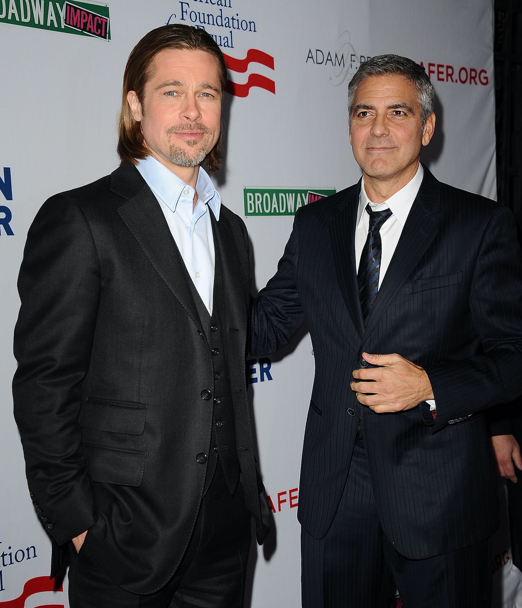 Brad Pitt and George Clooney at the premiere of '8'