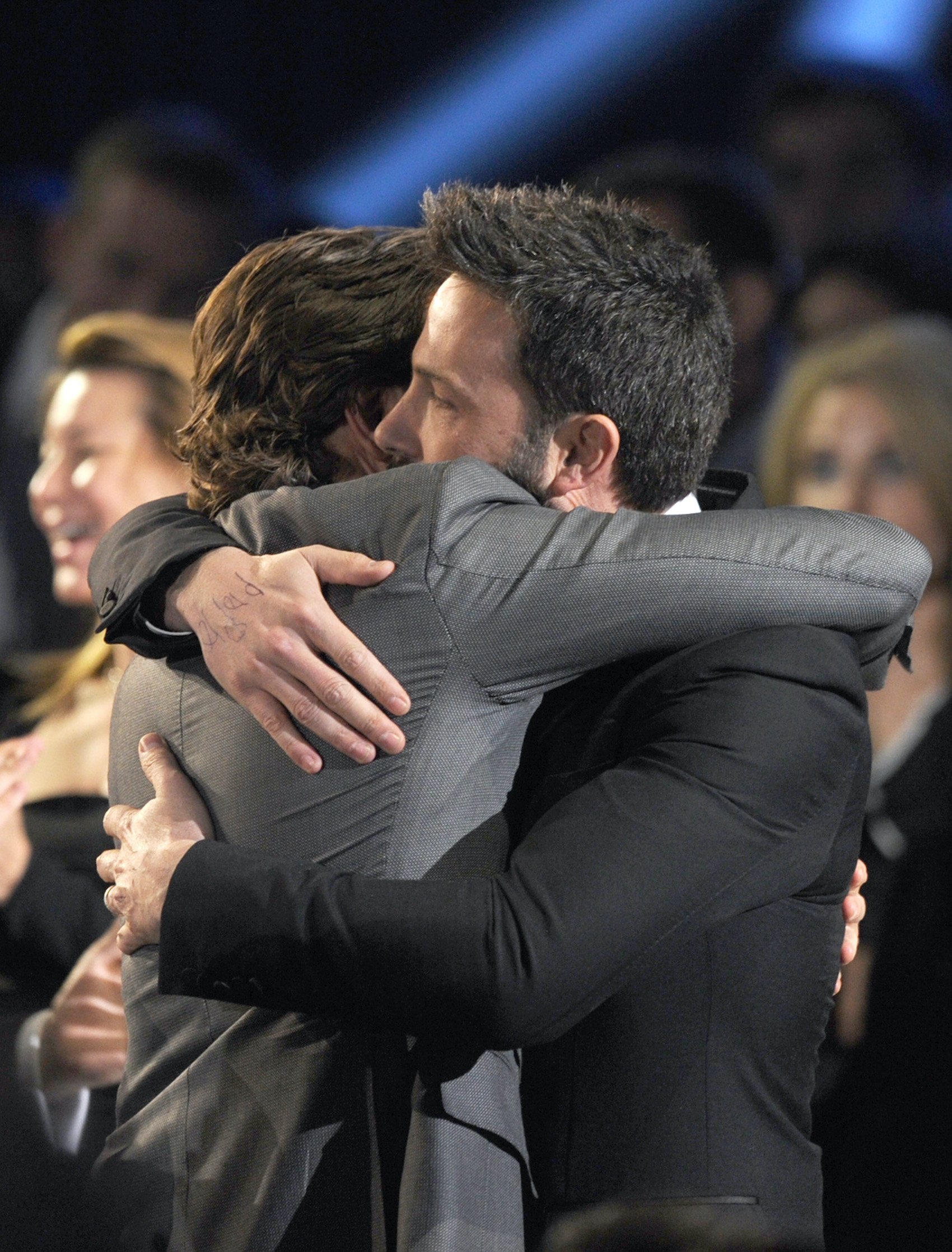 Bradley Cooper and Ben Affleck hug at the 2013 Critics' Choice Movie Awards