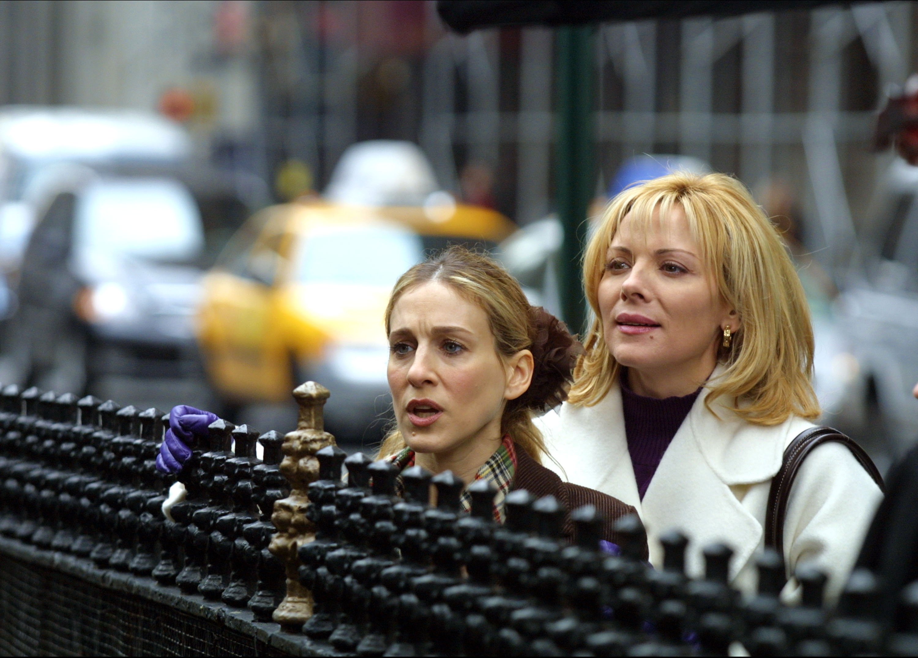 Sarah Jessica Parker as Carrie Bradshaw and Kim Cattrall as Samantha Jones