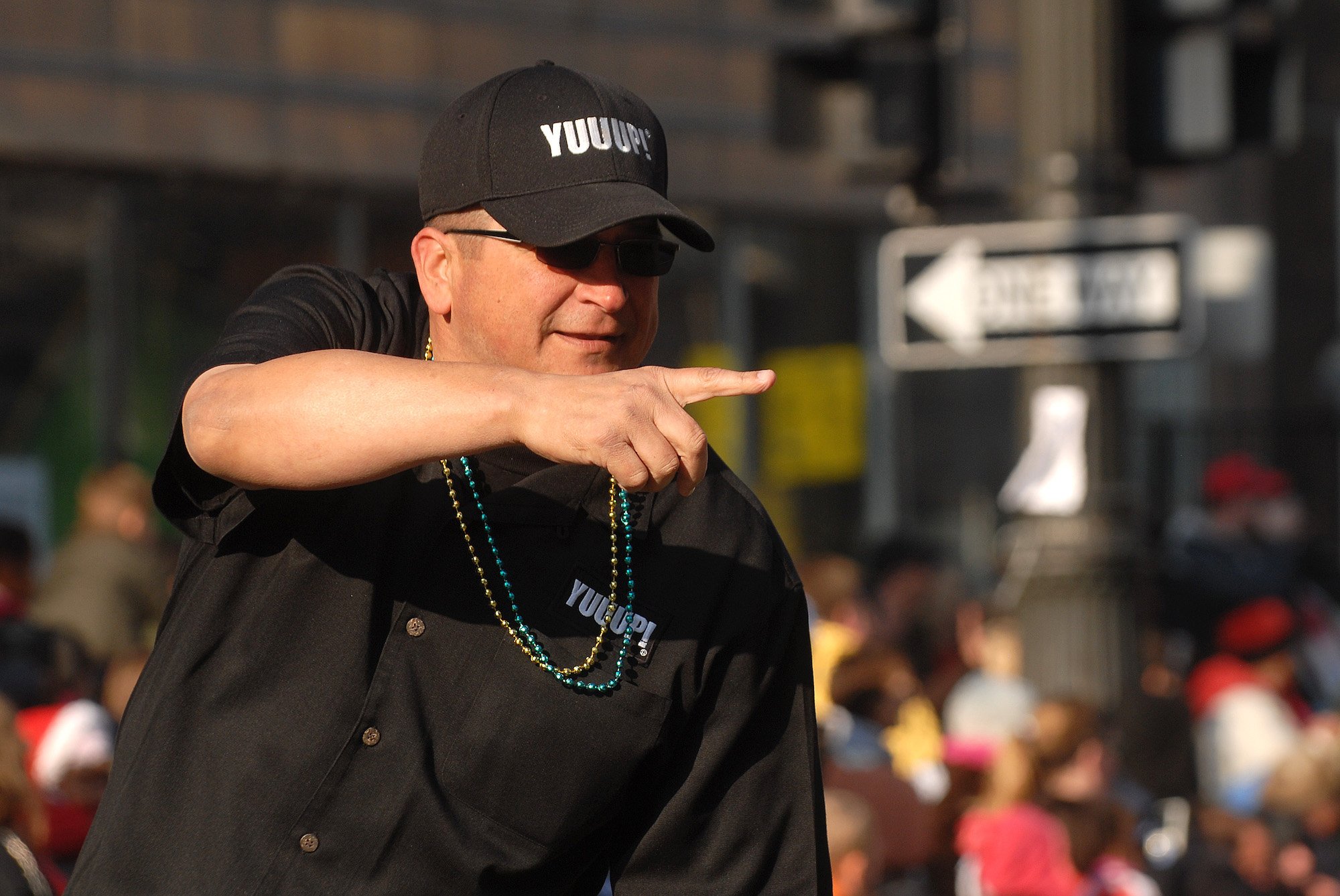 Dave Hester smiling, pointing to the right