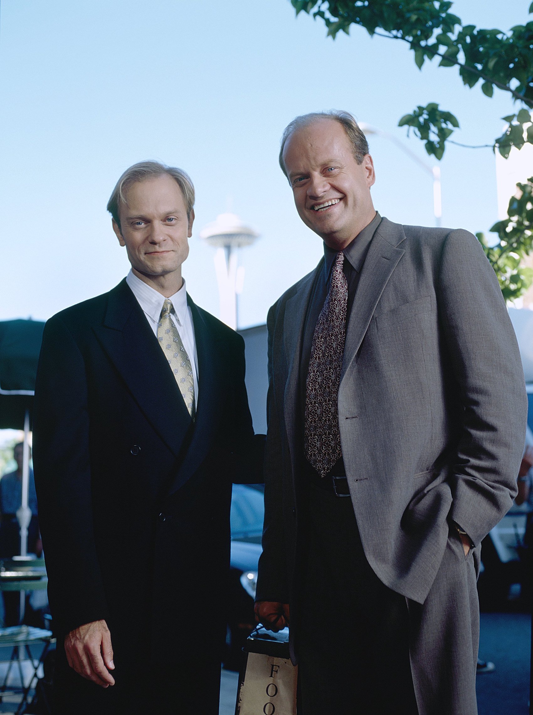 David Hyde Pierce and Kelsey Grammer standing in front of the Space Needle in 'Frasier'