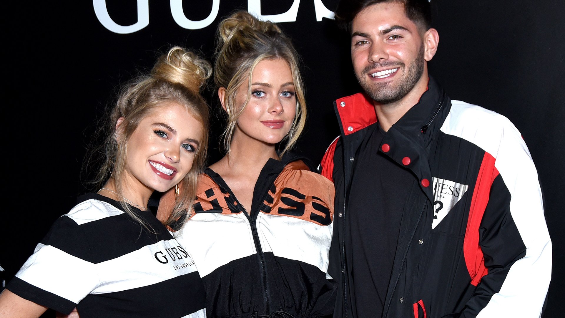 Bachelor Nation stars Demi Burnett, Hannah Godwin and Dylan Barbour attend GUESS Kicks-off Holiday Season at The Peppermint Club on November 07, 2019 in Los Angeles, California.