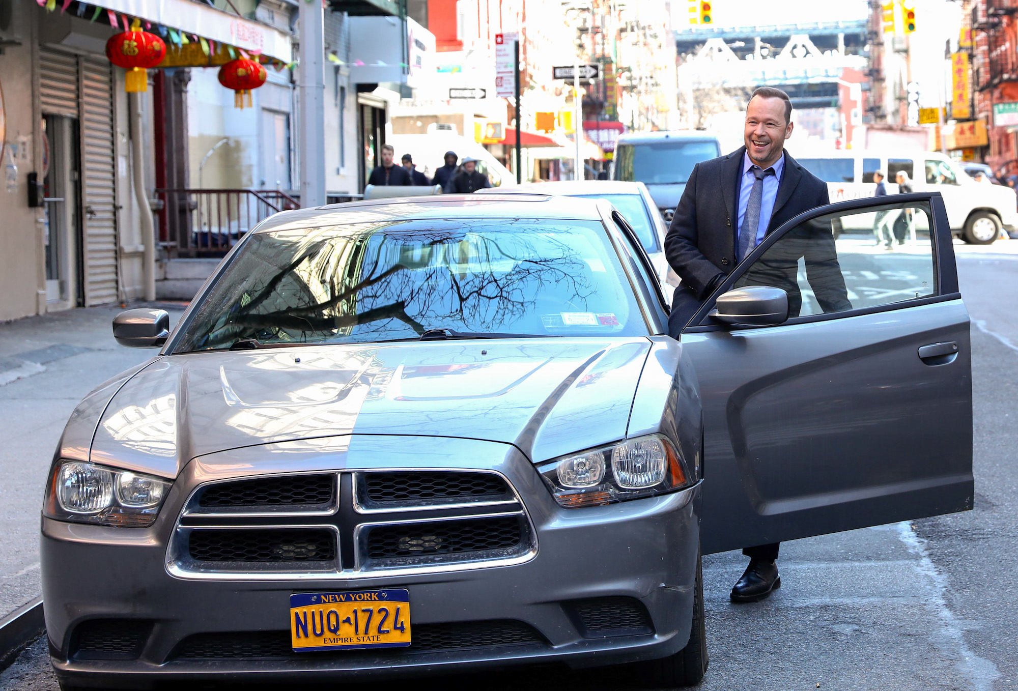 Donnie Wahlberg getting into a car on 'Blue Bloods'