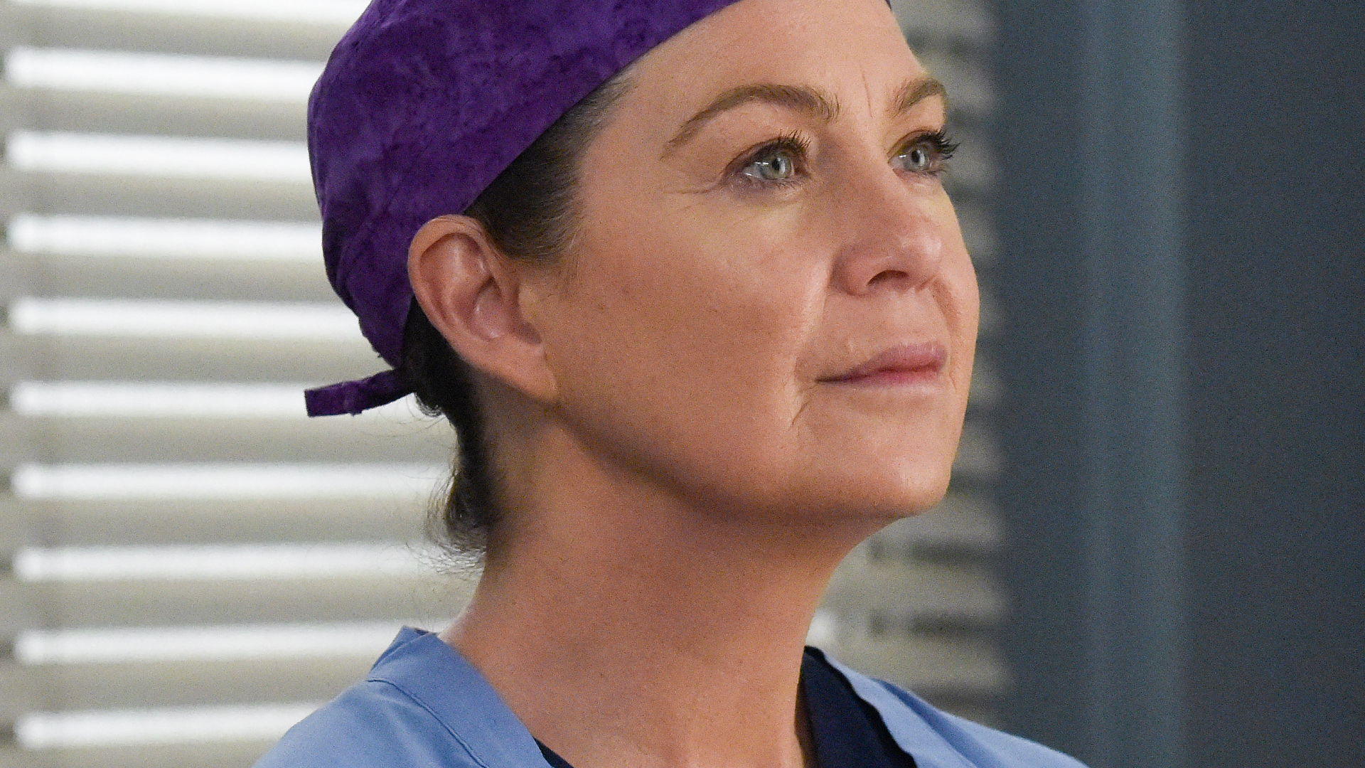 Ellen Pompeo as Meredith Grey wearing a scrub cap on 'Grey's Anatomy' Season 16