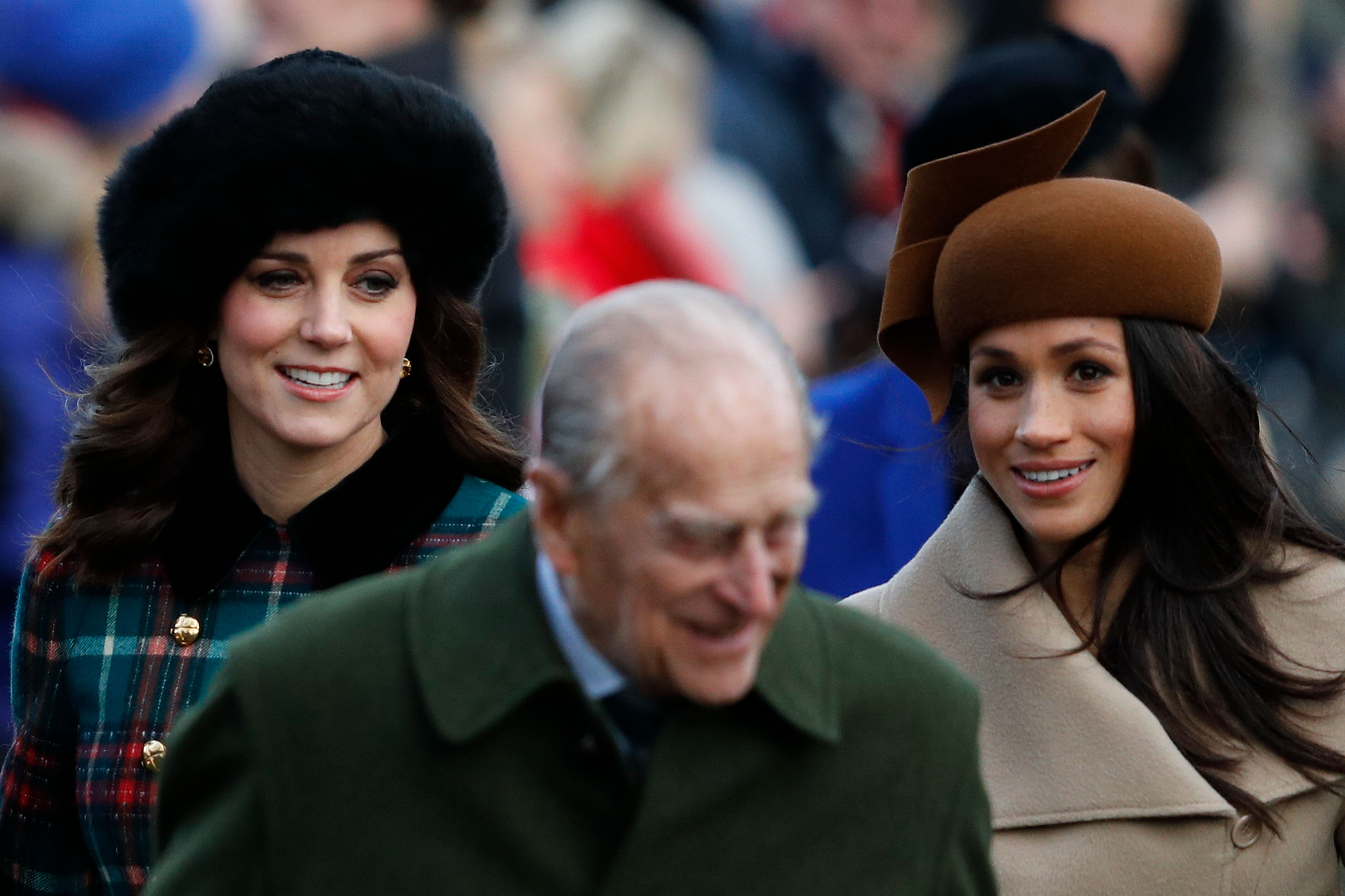 Kate Middleton, Meghan Markle, and Prince Philip
