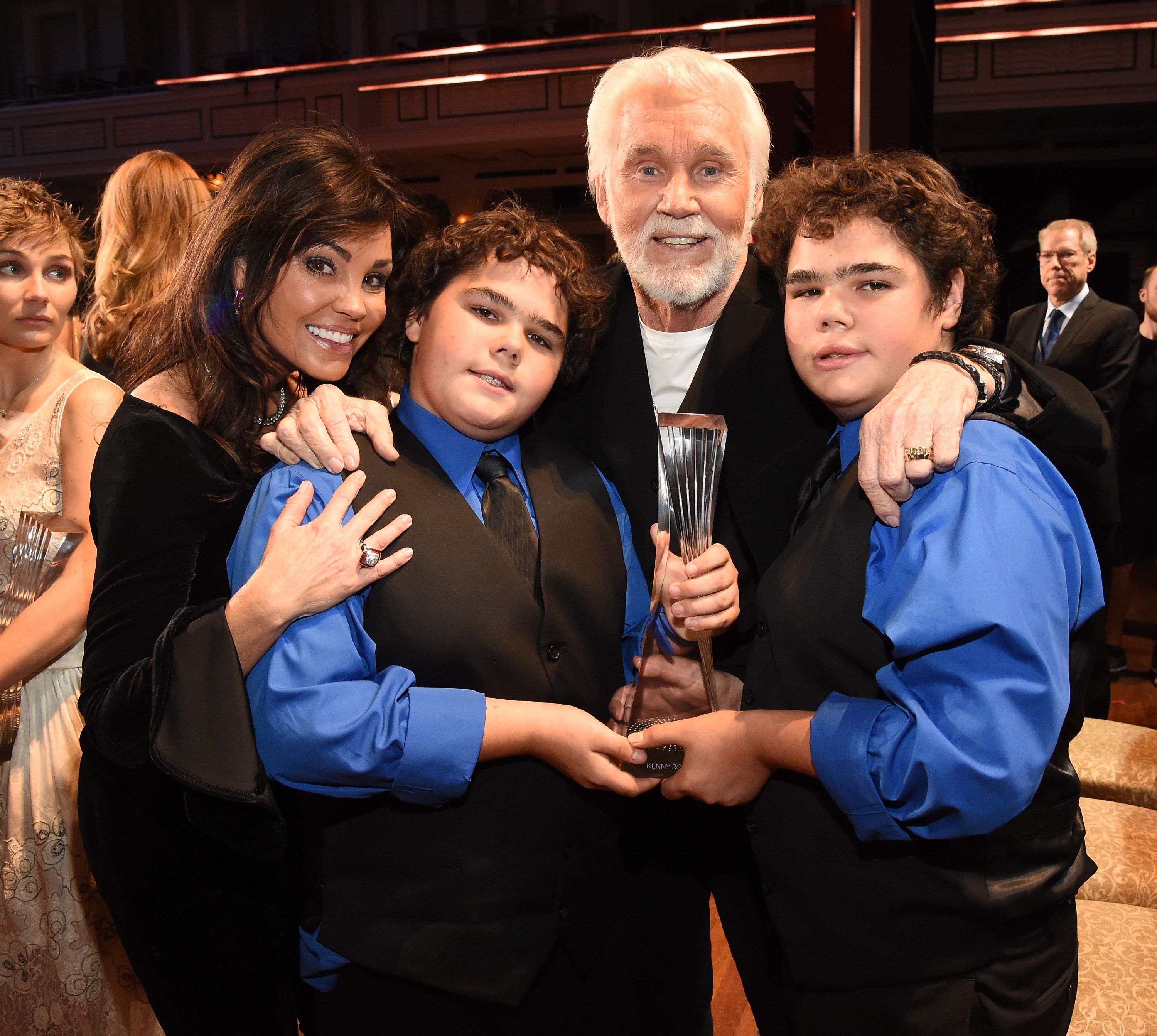 Wanda Miller, Kenny Rogers, and their sons |  Rick Diamond/Getty Images for CMT